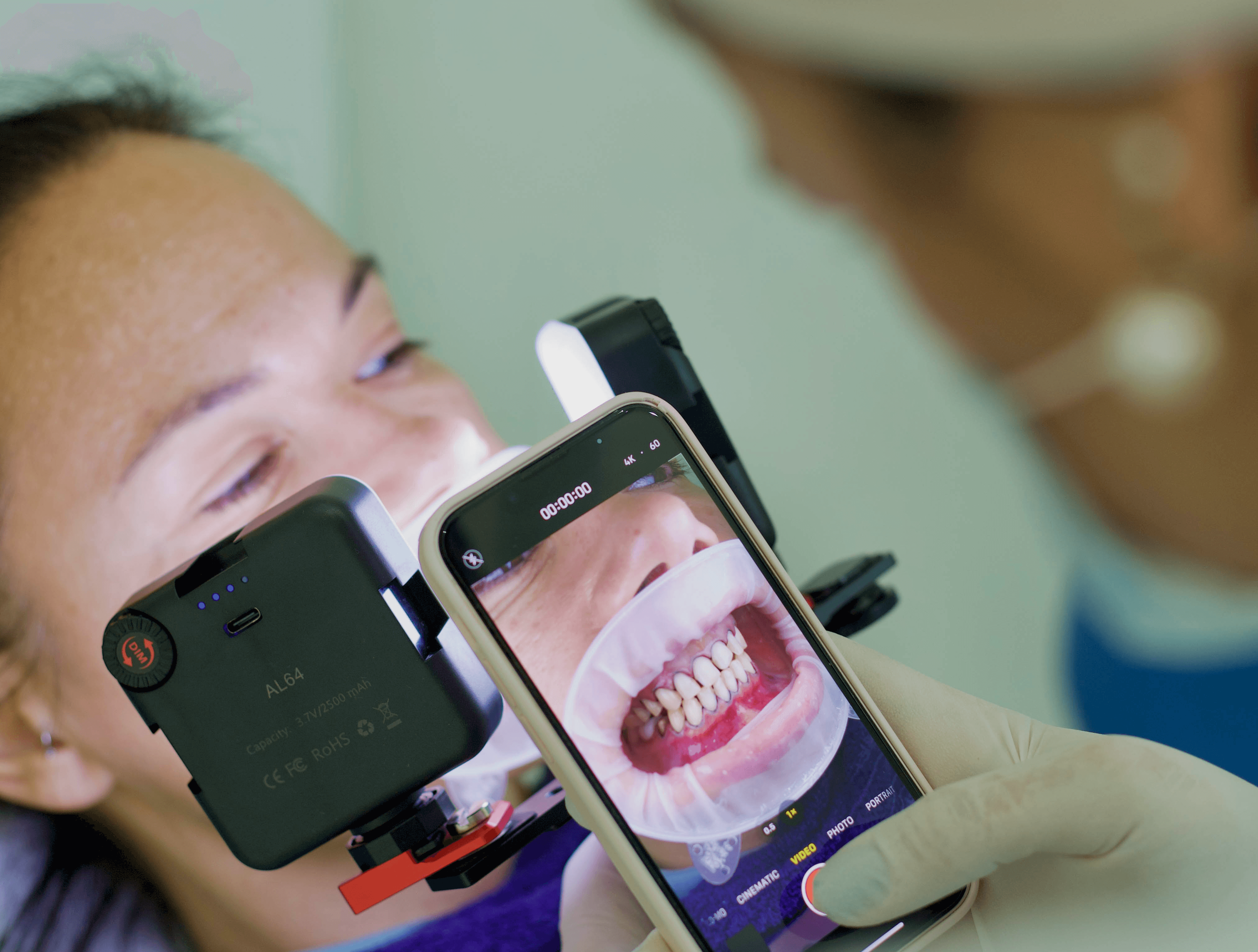 A woman having an initial consultation with an Invisalign Center dentist for her transparent braces