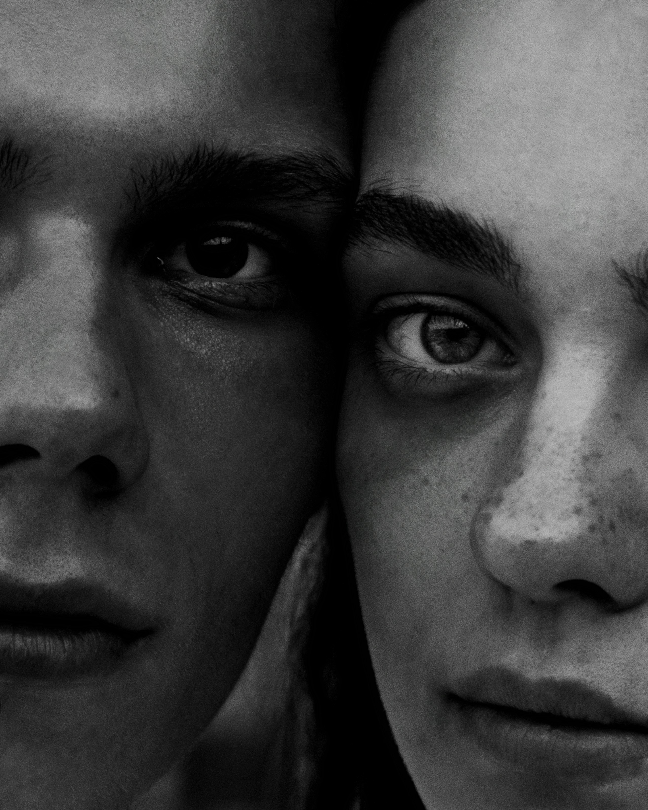 grayscale photo of man and woman