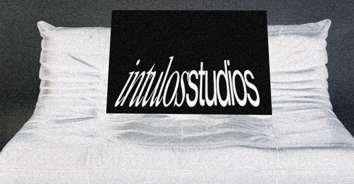 people sitting near table with laptop computer