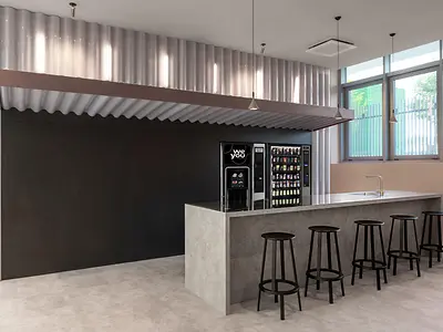 Vending machines and snack bar with stools at Florentia Living student accommodation, Florence