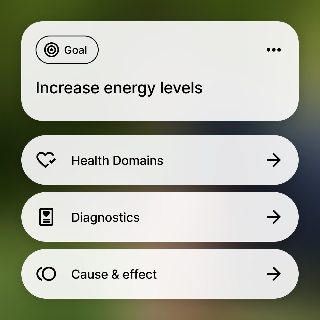 a gloved hand holding a test tube filled with liquid