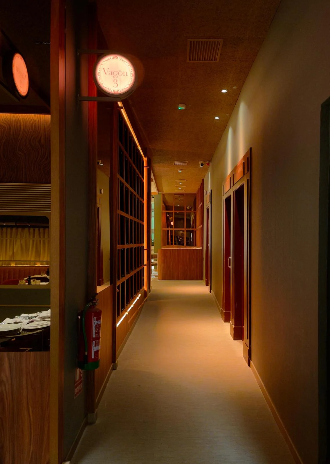 A vintage race car with blue, orange, and white livery