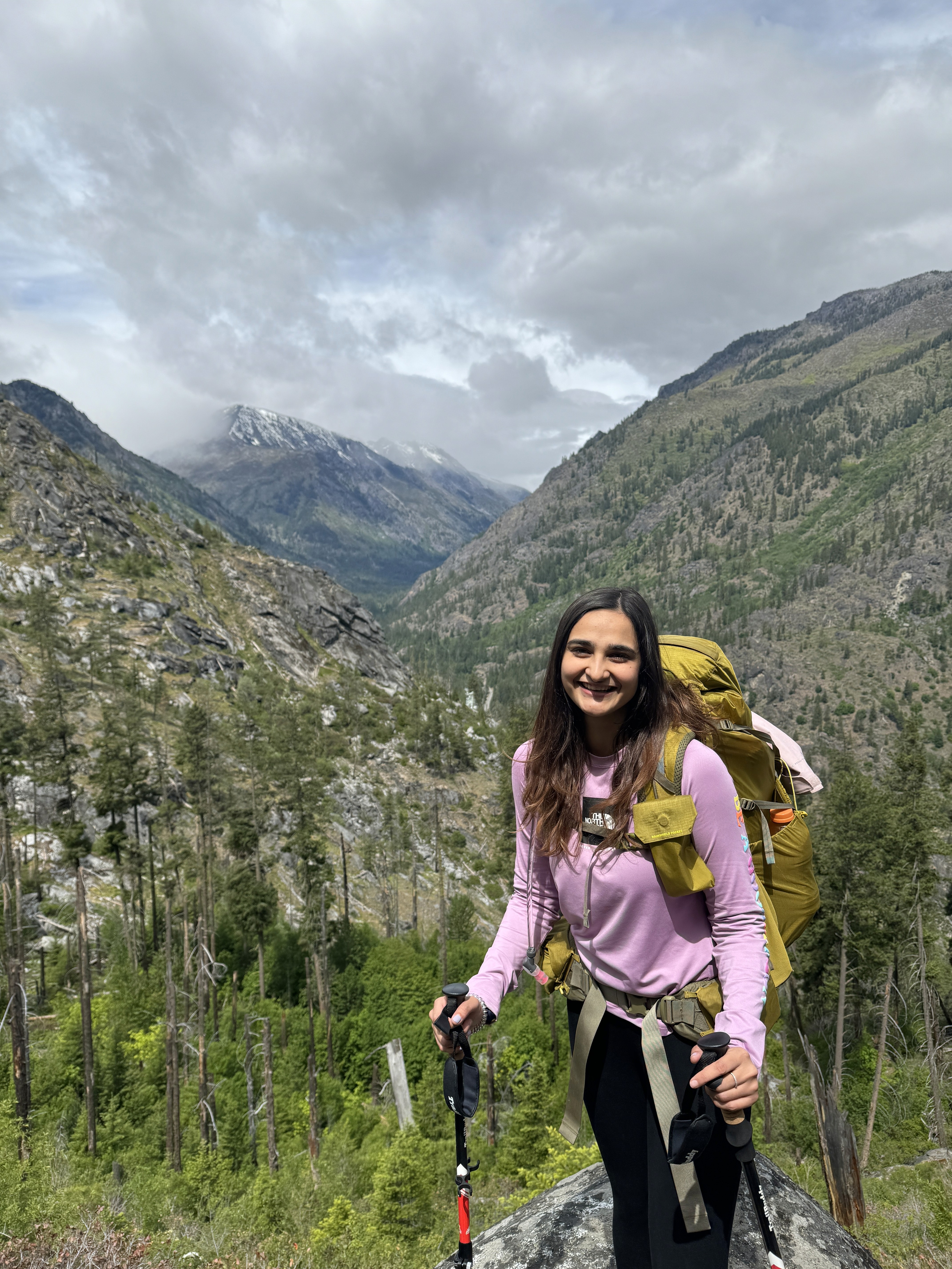 Photo of Ruchika hiking with a backpack