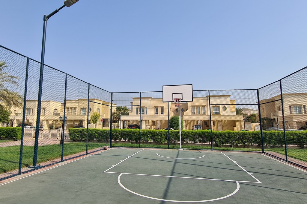 A large home with a vehicle parked in front, designated "Springs 15."