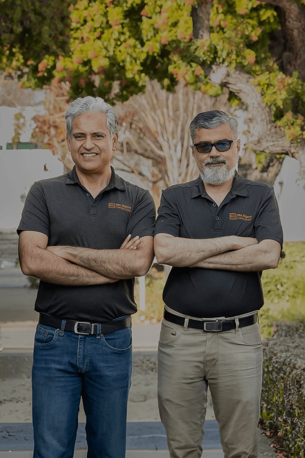 Interior bedroom with modern furnishings and large windows, representing Six Sigma Construction’s design-forward custom home work.