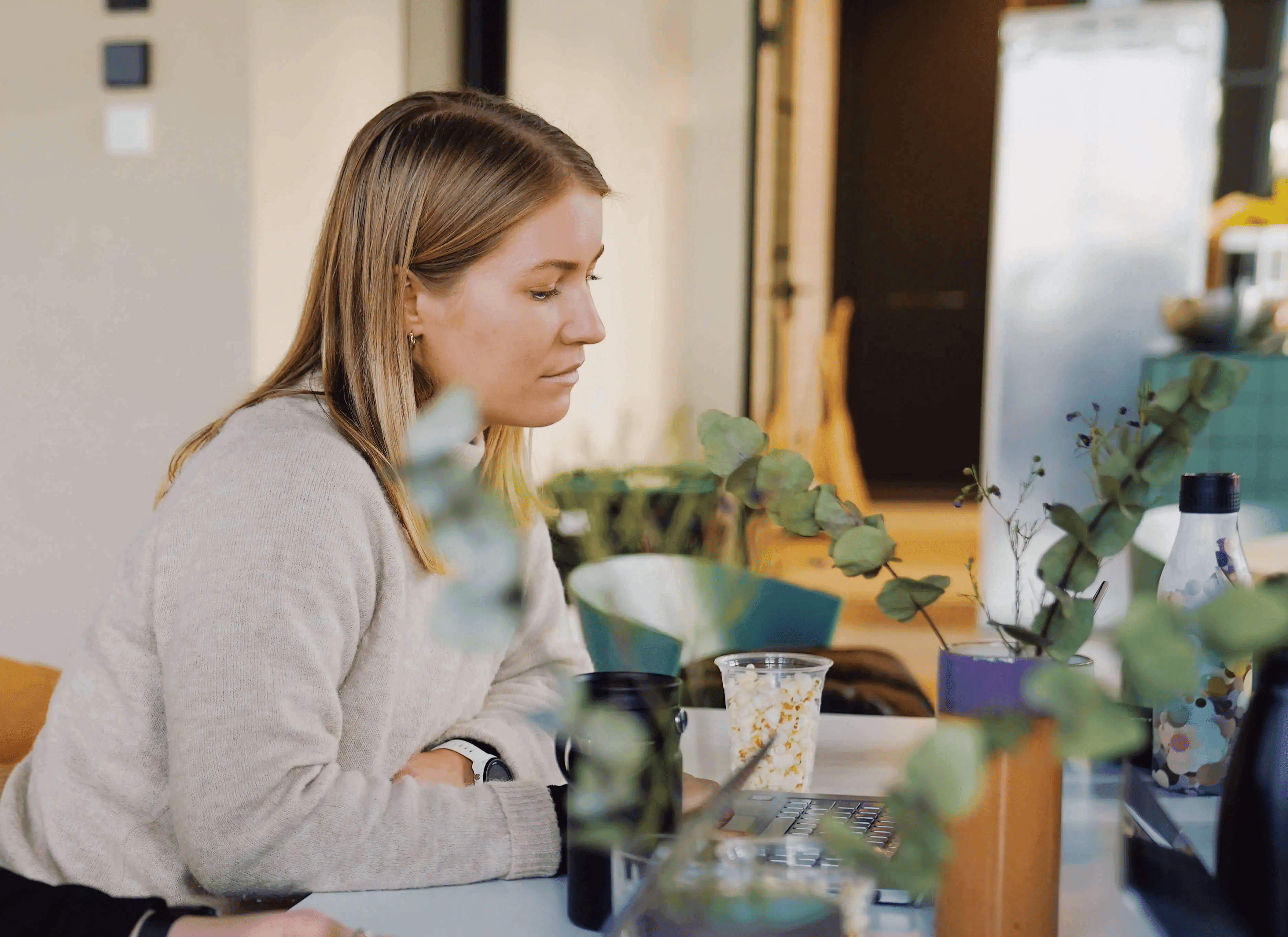 Woman working on computer at office desk for recruiters showing digital work