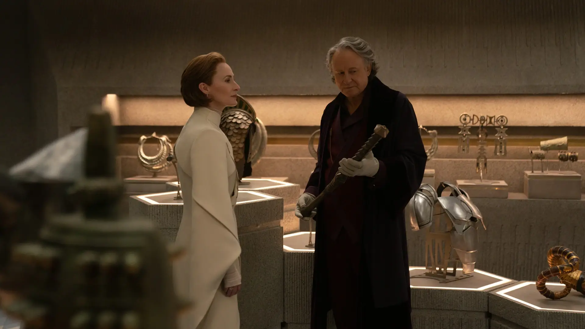 Mon Mothma and Luthen Rael examining artifacts