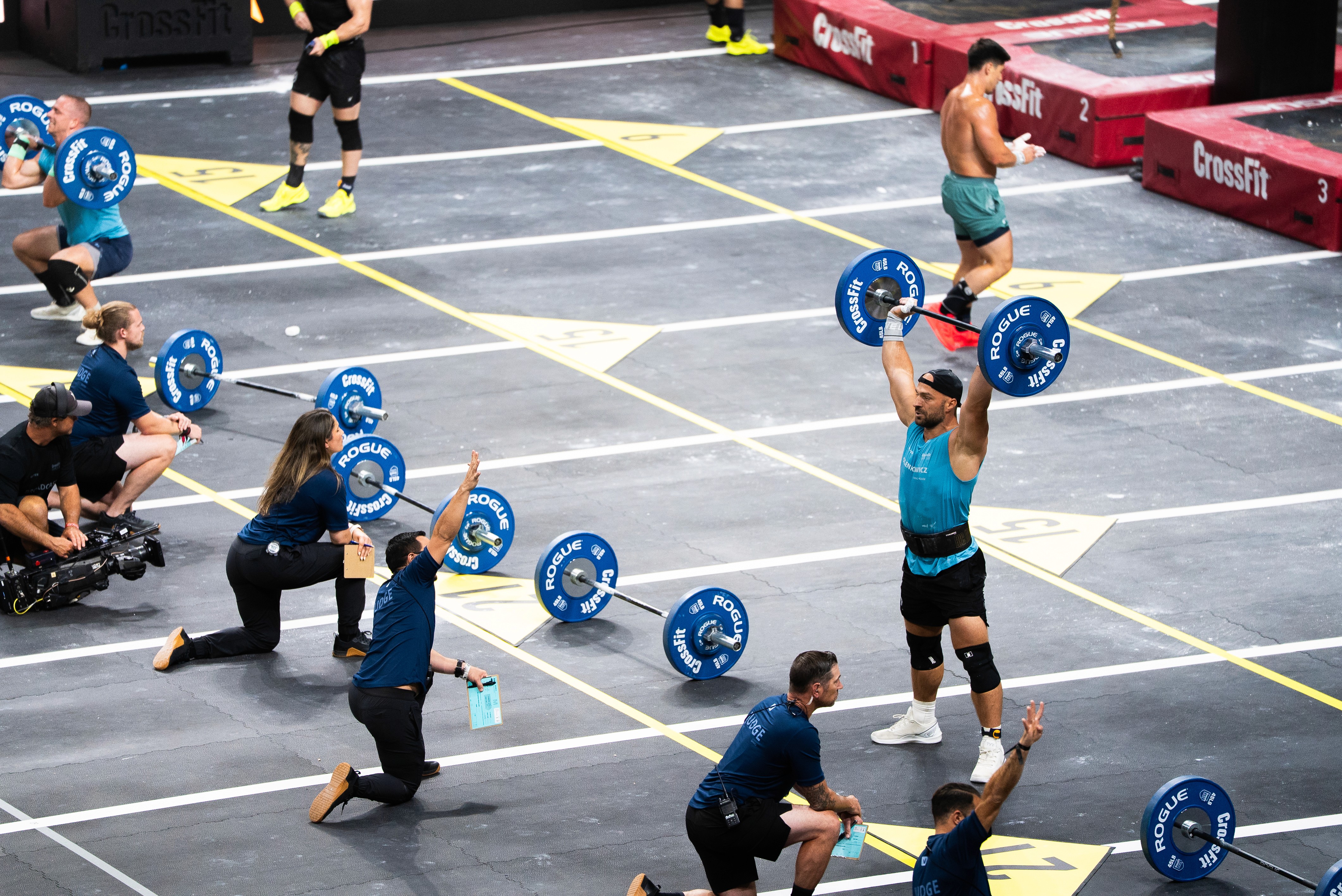 A woman with a head made of mirrors, reflecting light and creating a kaleidoscopic effect around her.