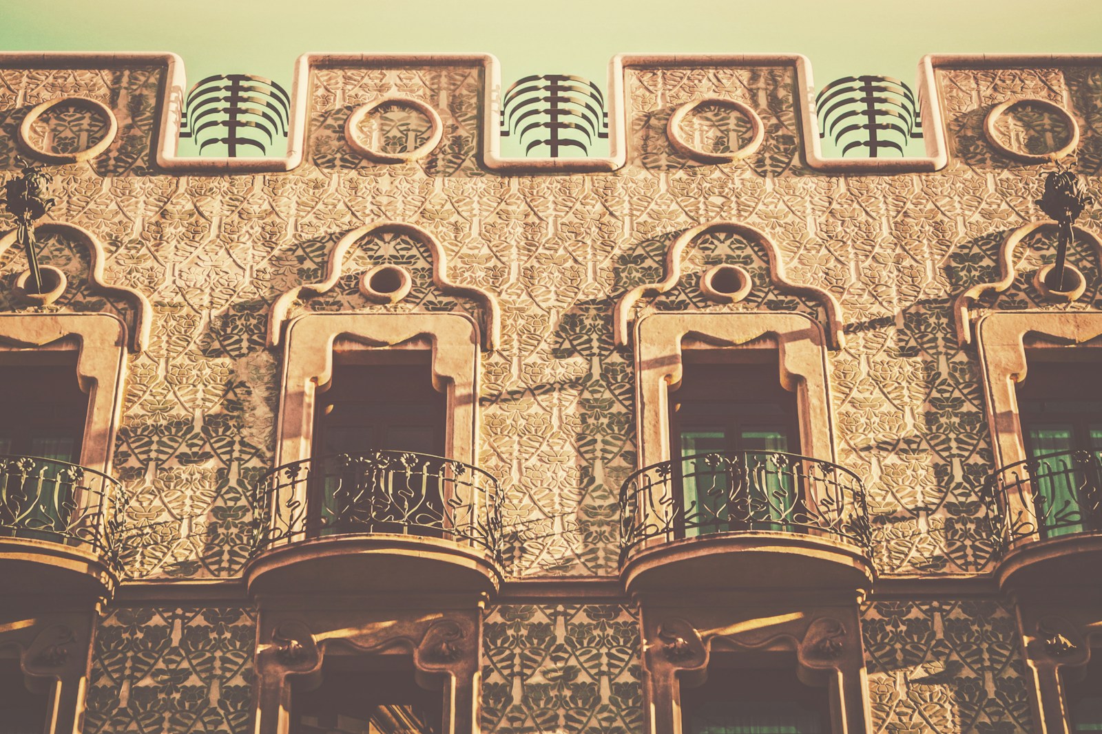 Historic Barcelona residential façade with balconies