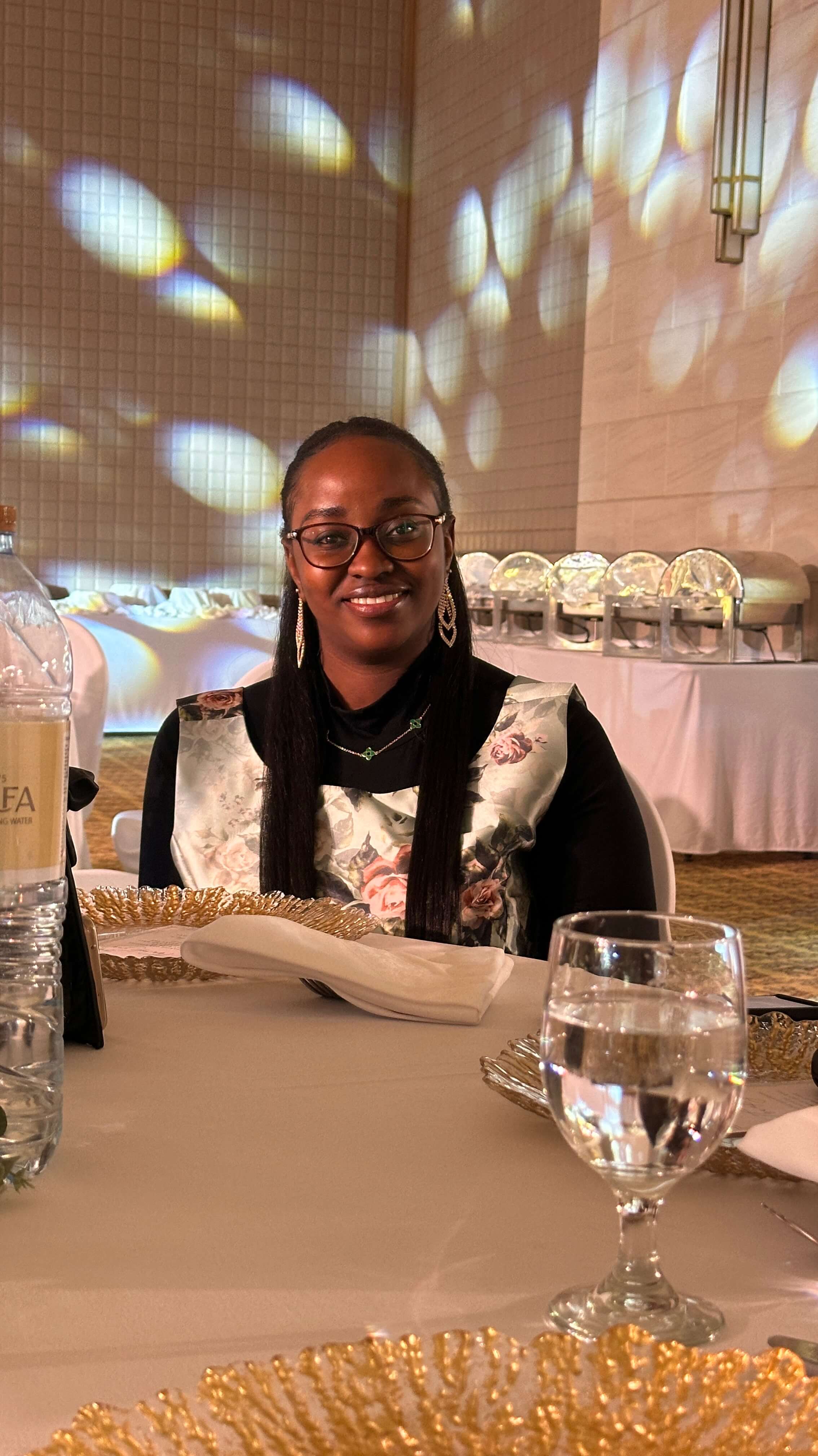 Jane at a dinner table