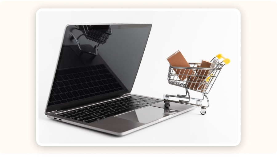 Mini shopping cart and laptop