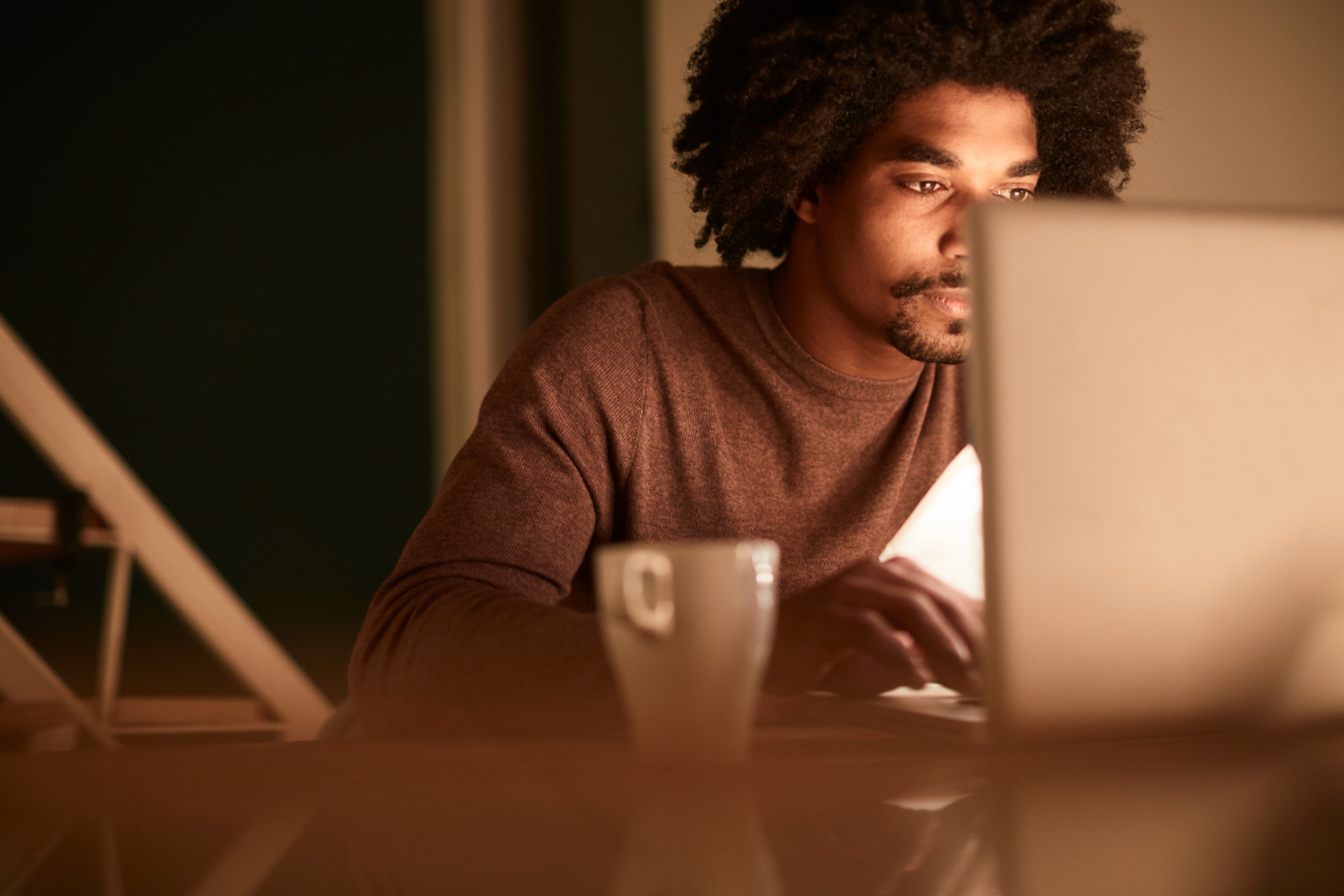 a house with a balcony and a balcony railing