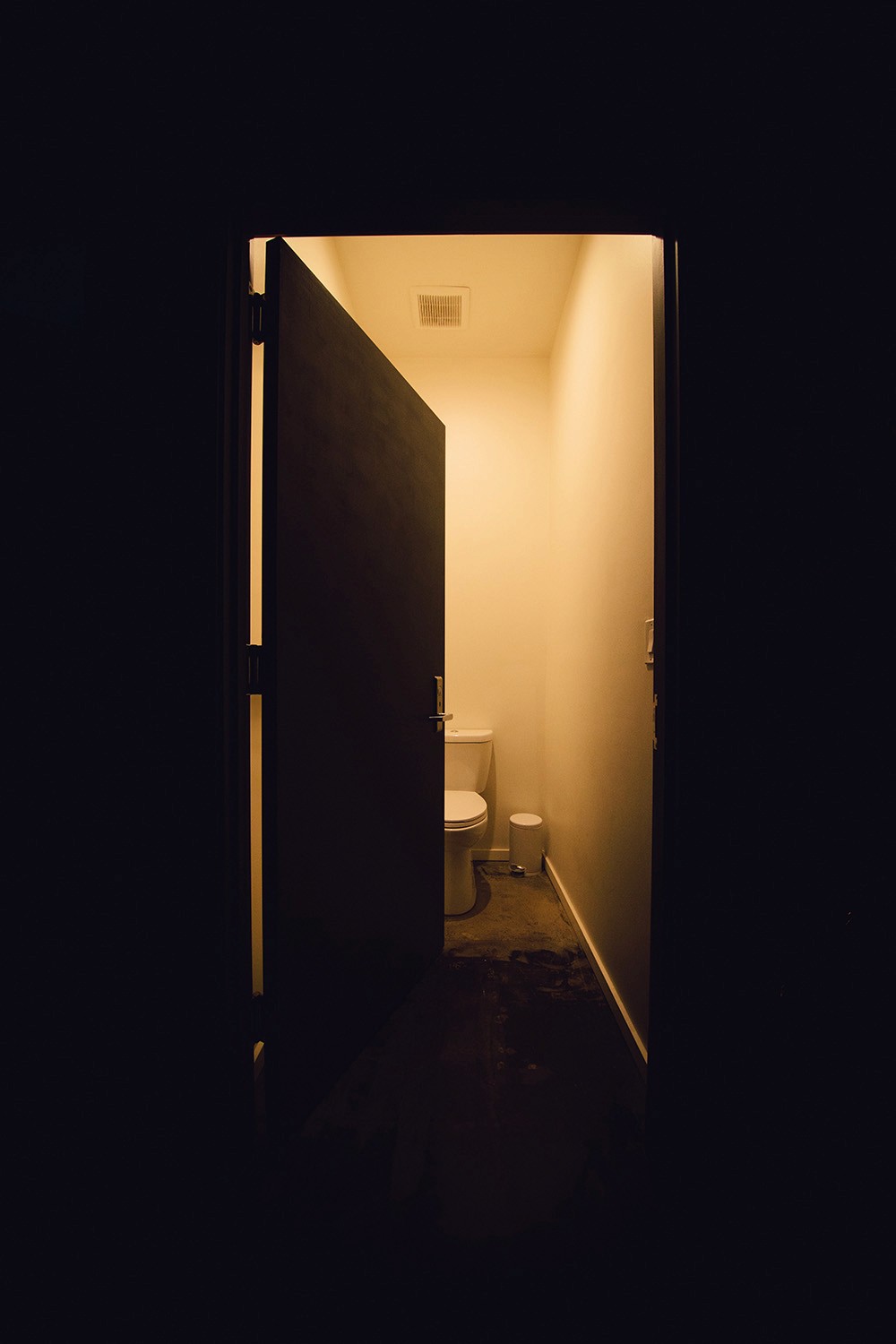 The "Traditional" bathroom in the washroom at Particle Studio in Seattle, WA. It features an ordinary toillet and bathroom set up.
