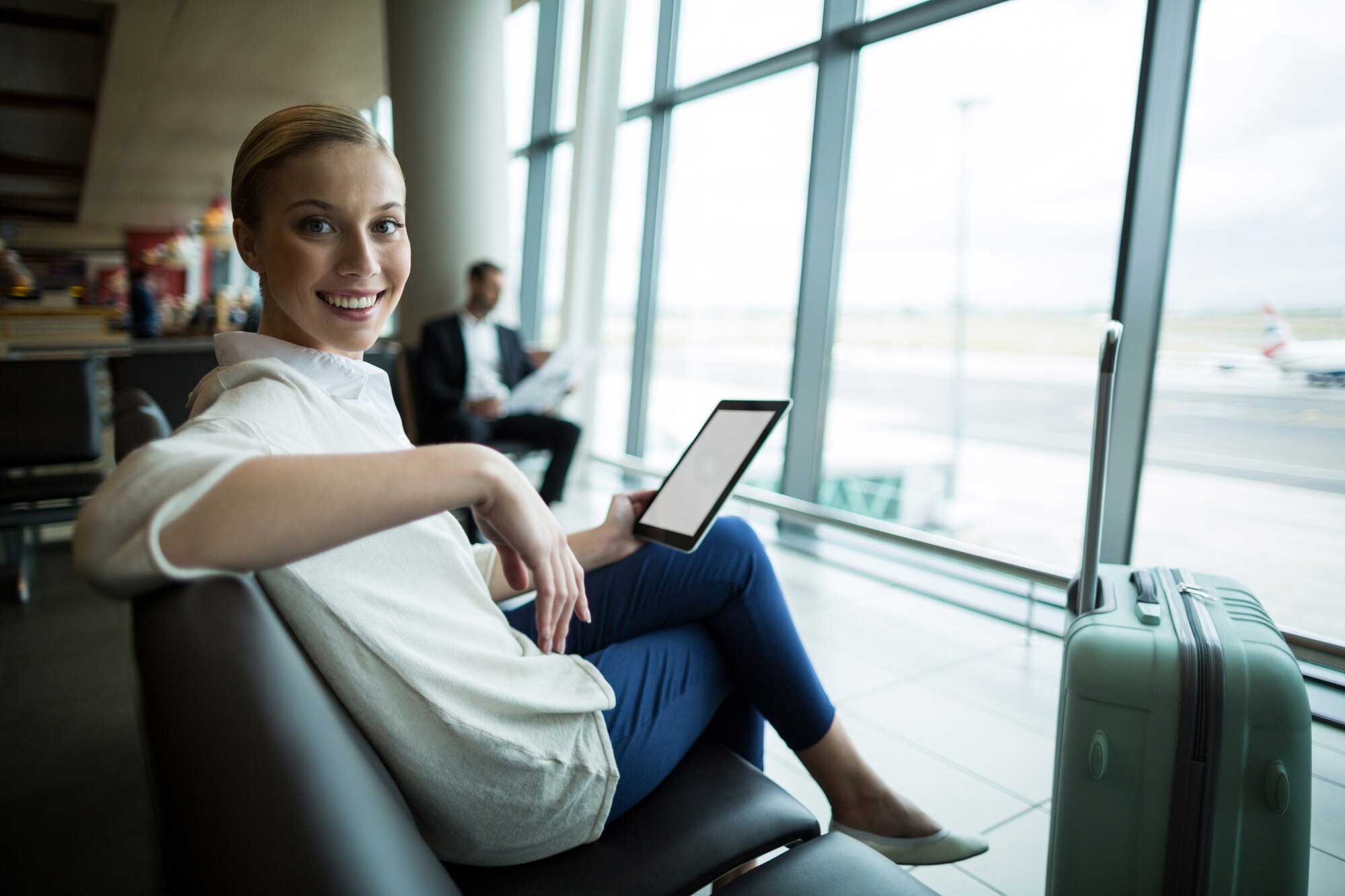 Happy lady at airport