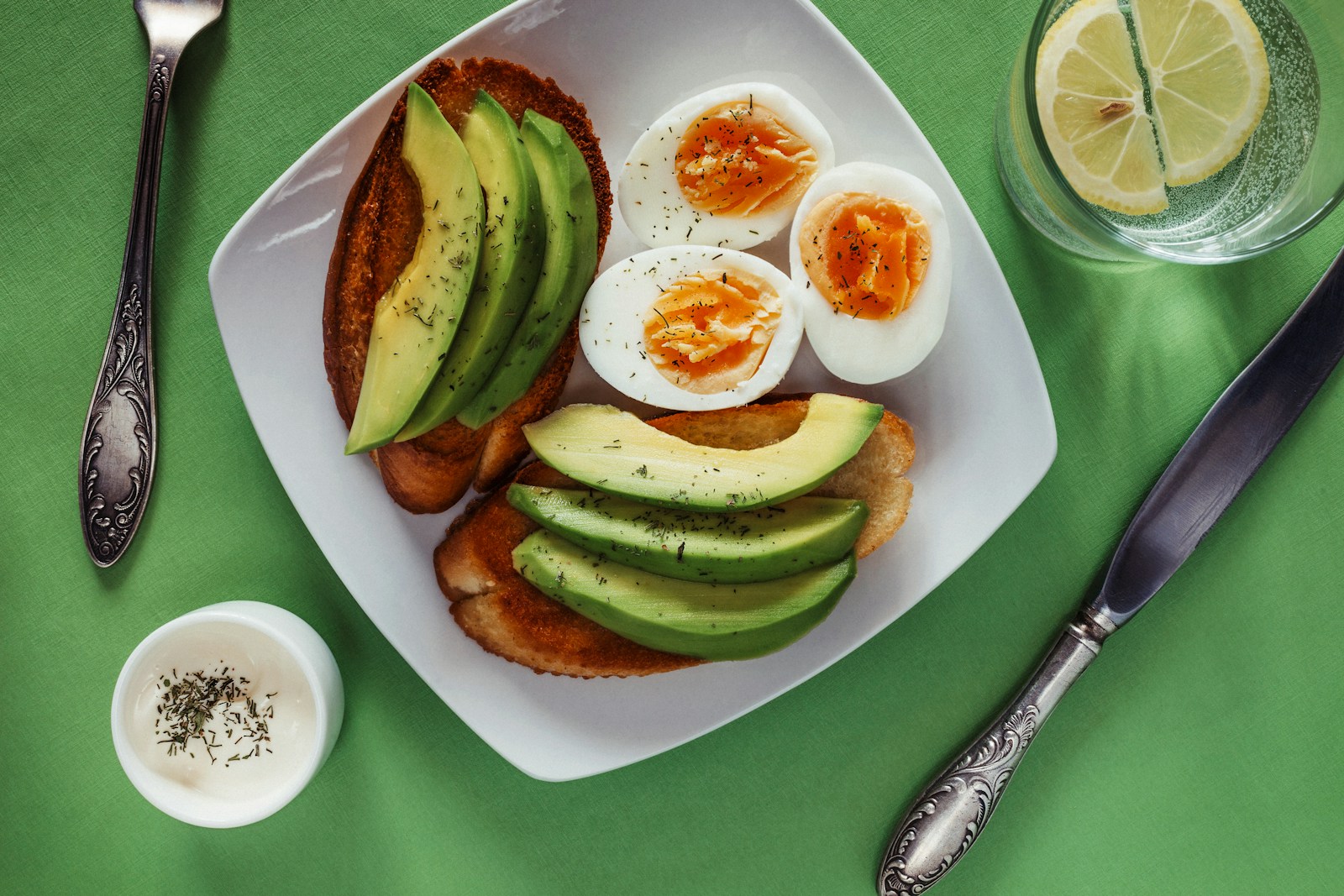 A quick protein-rich breakfast of eggs and avocado toast for steady energy on a busy morning.