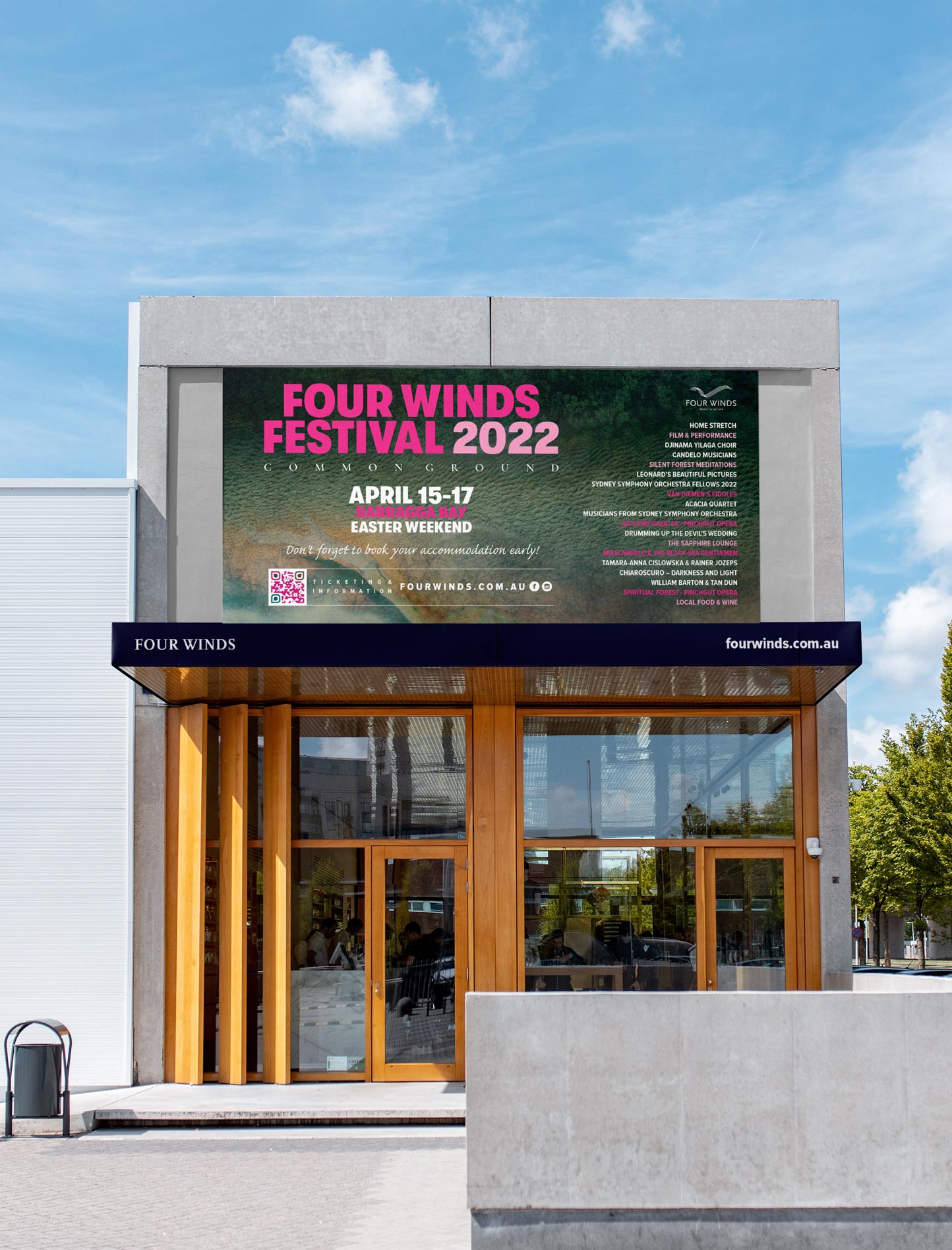 Four Winds festival billboard design with illustration and brand typography.