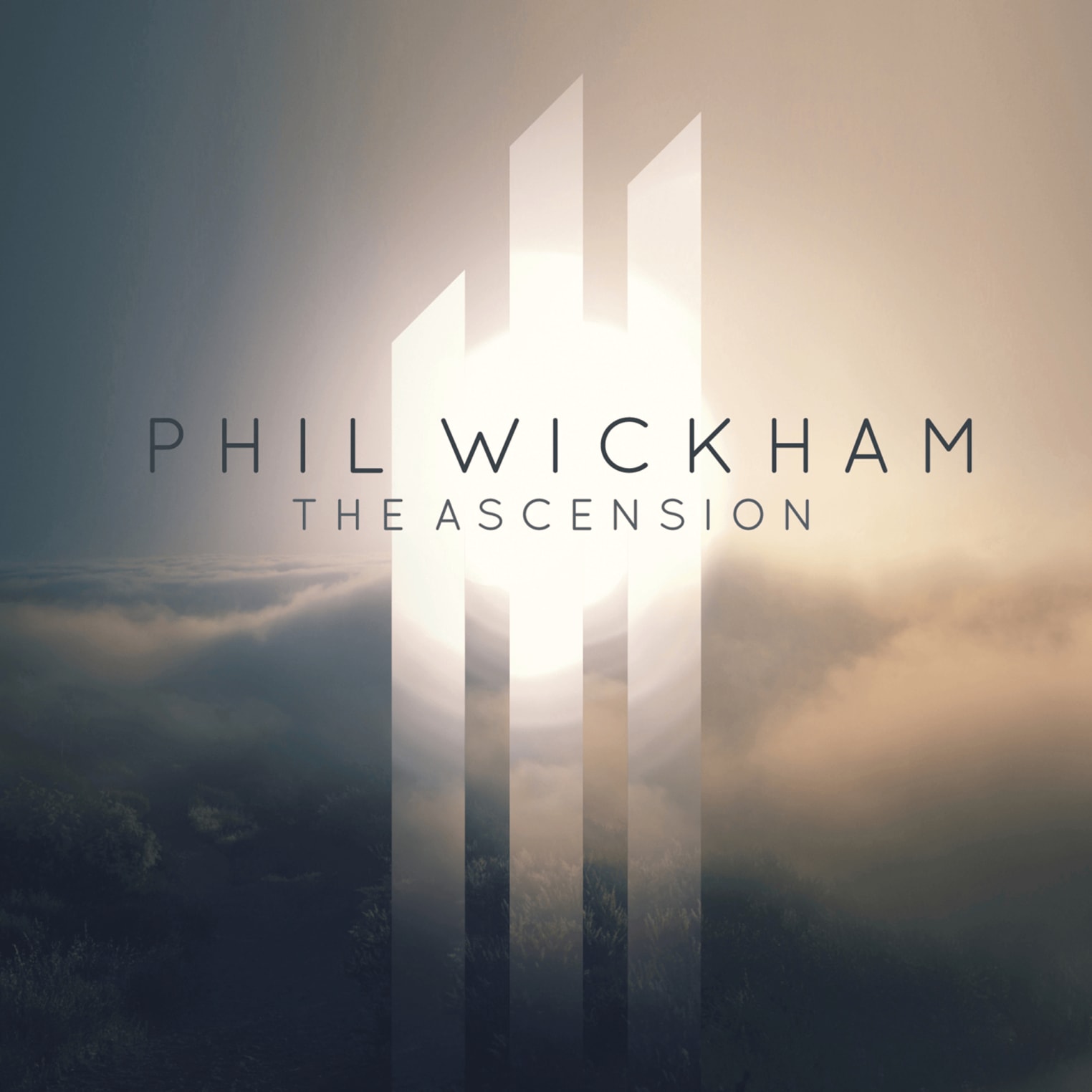 Album artwork for "This Is Amazing Grace" by Phil Wickham, showing sunlight streaming through four vertical bars over a misty landscape.