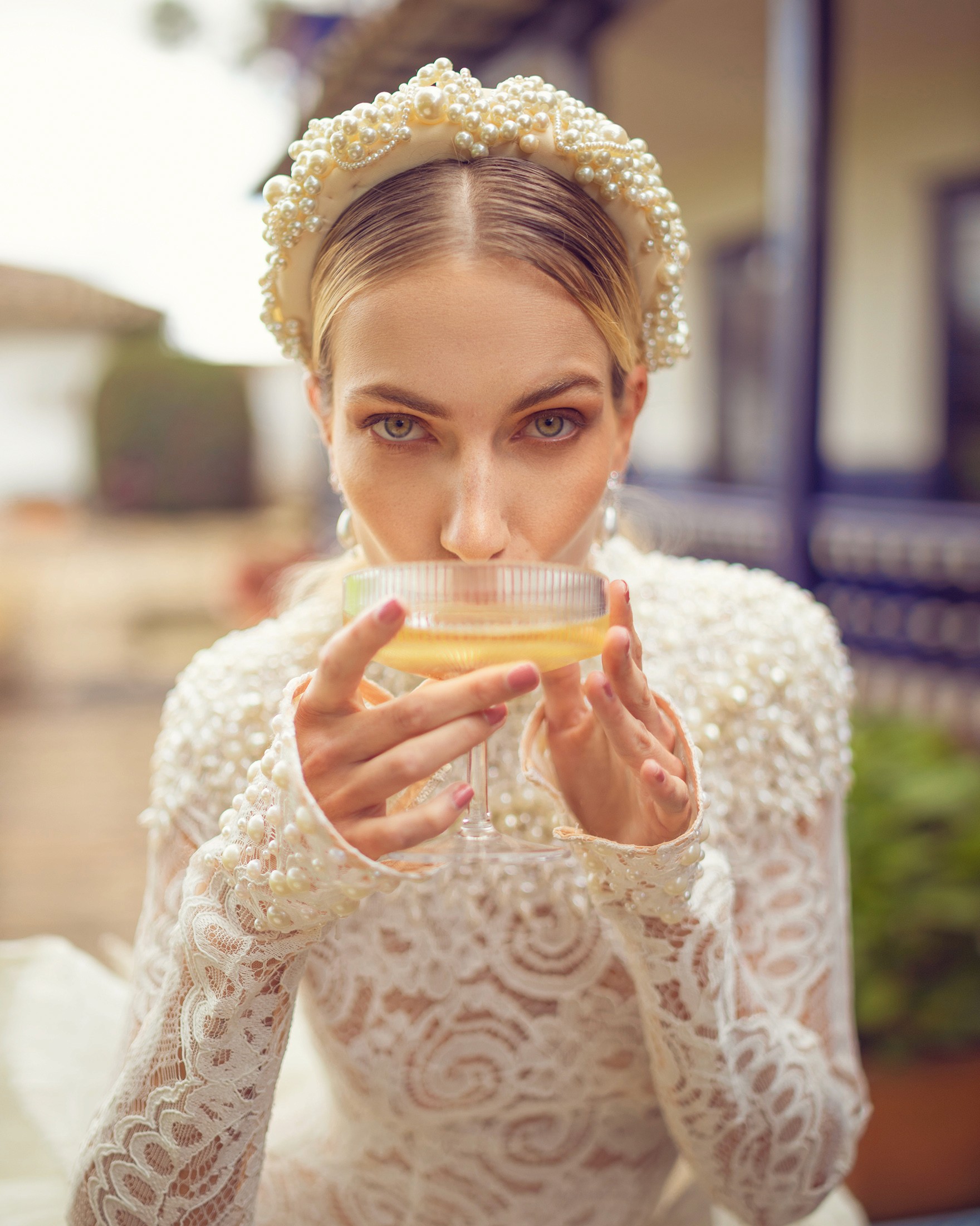 Creative portrait with geometric pink eyewear and bold fashion styling in urban setting