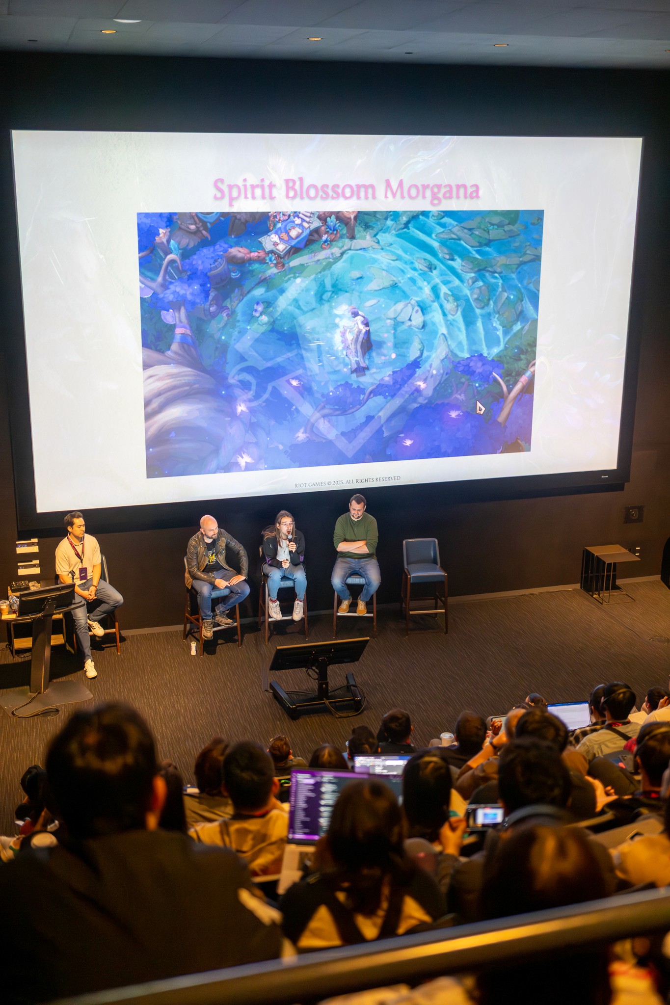 An overview of the main presentation area with a large screen displaying game content.