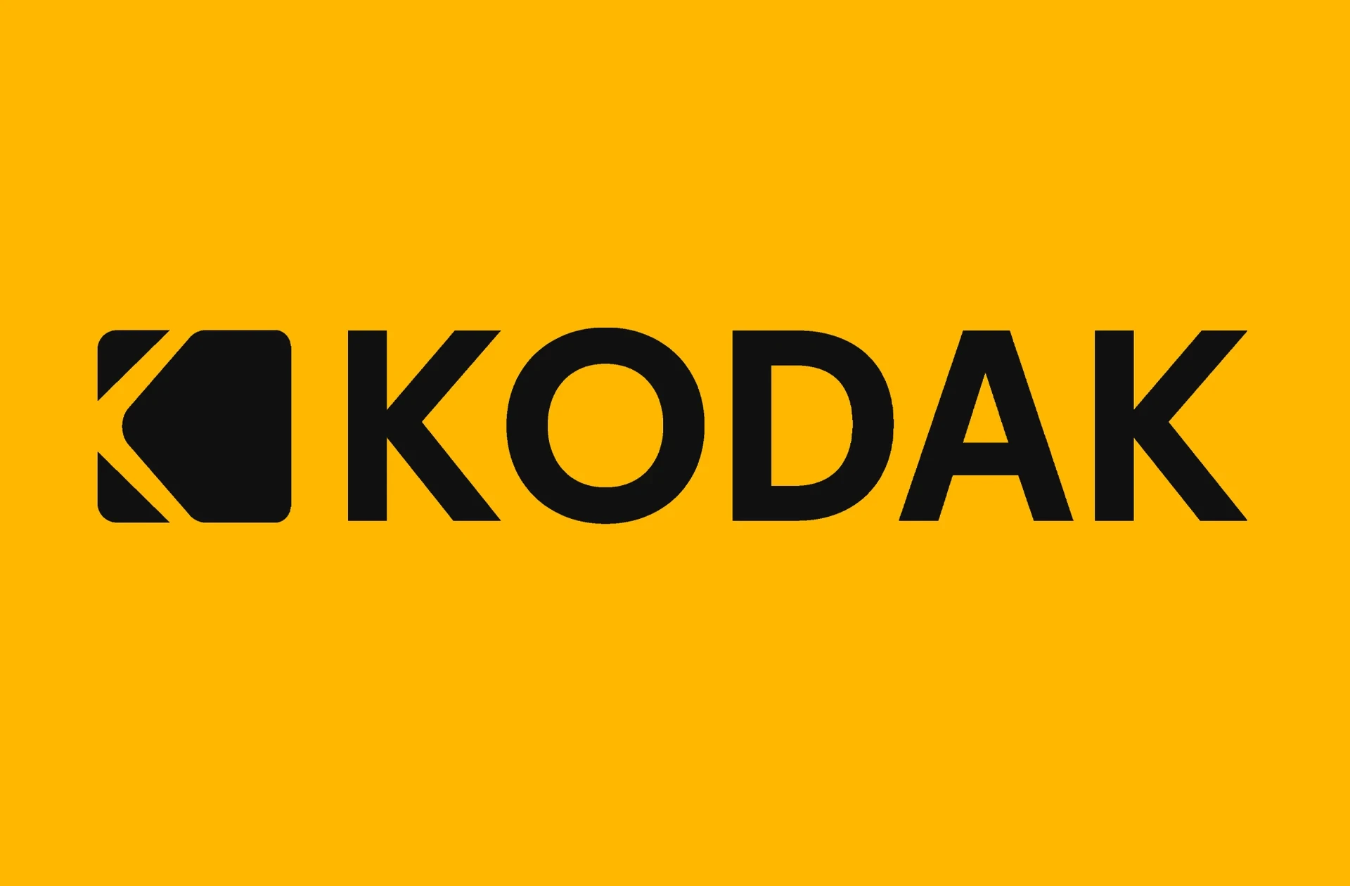 Kodak logo in bold red and yellow, representing the brand’s iconic visual identity.