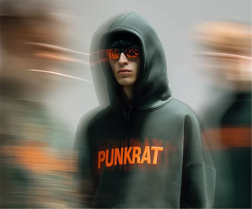 Person wearing hoodie with motion blur effect