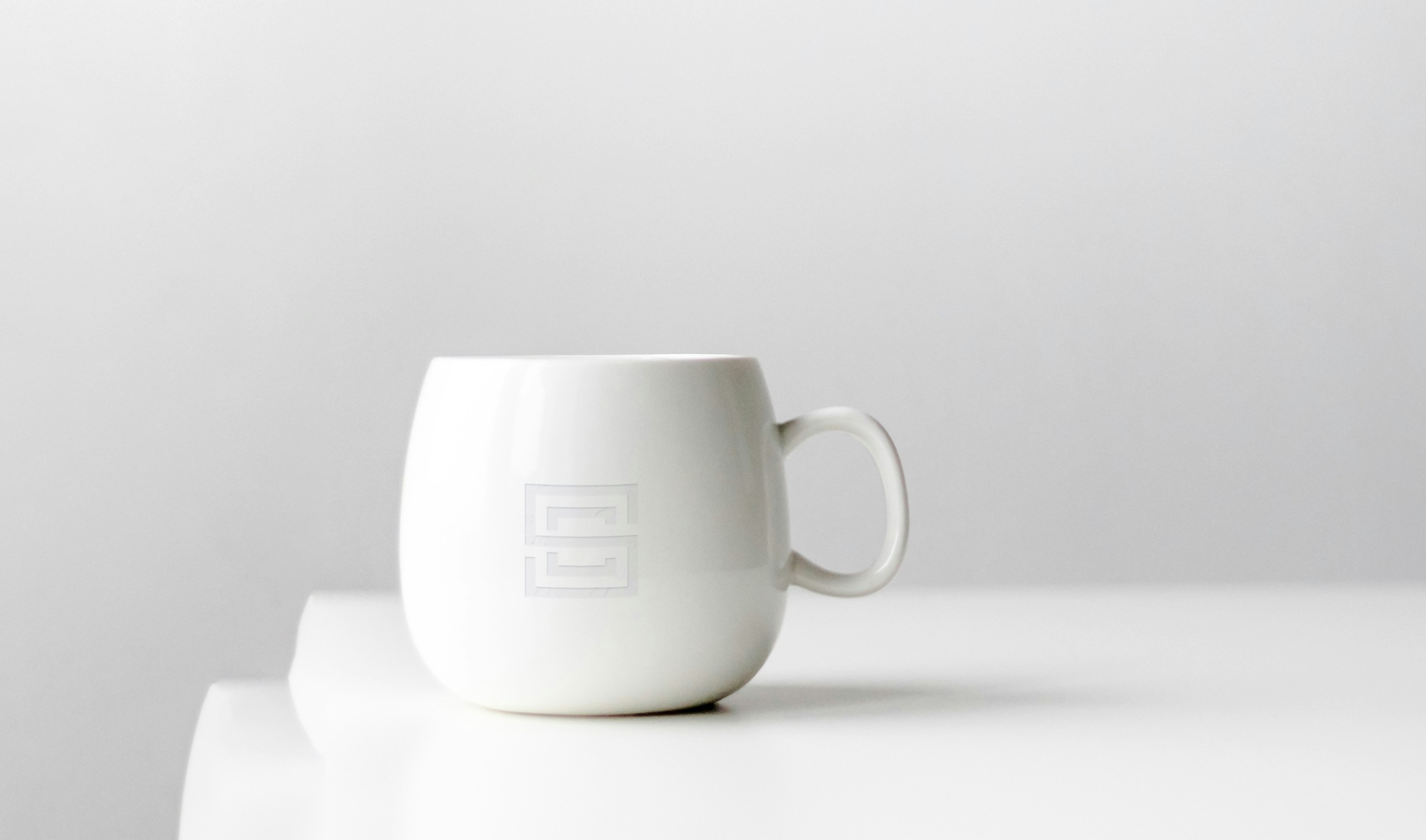 Cro Sea Villas brand identity — minimalist mug and product design mockup