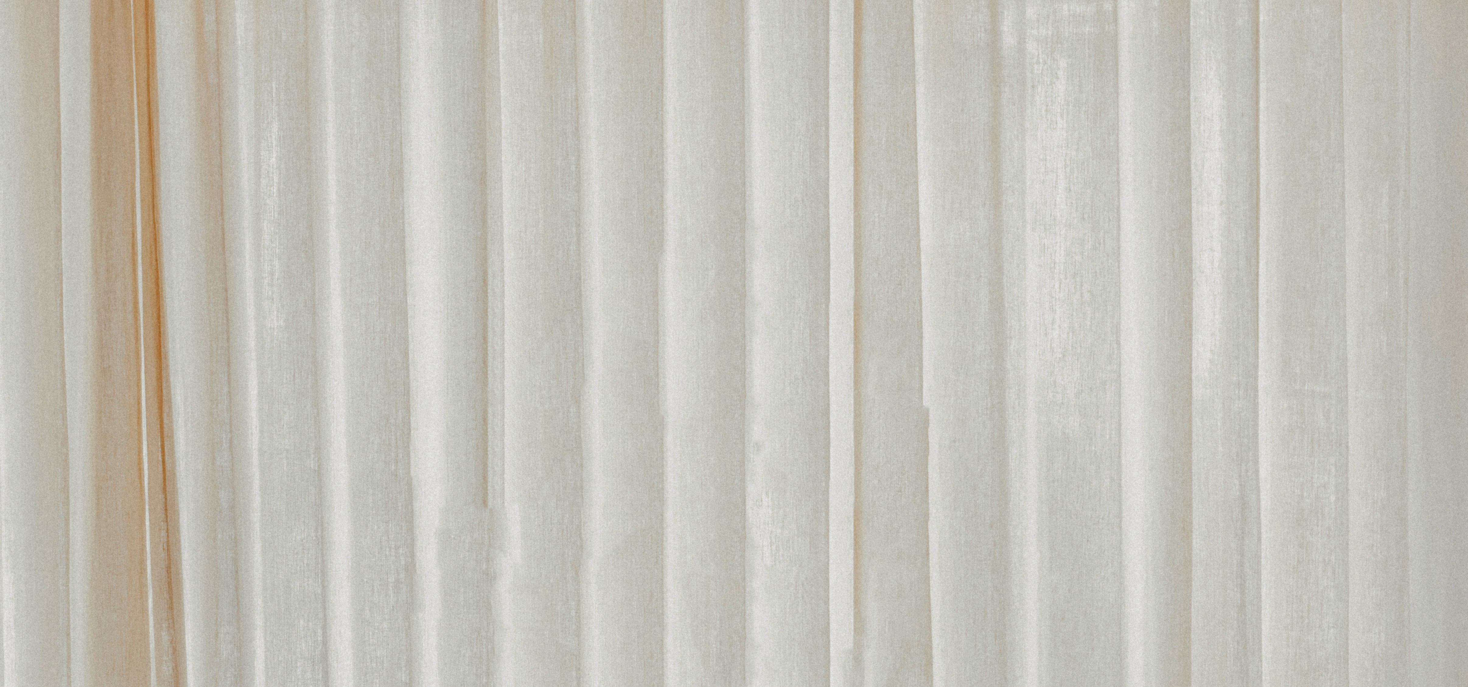 Fashion photoshoot with a woman posing in a dress