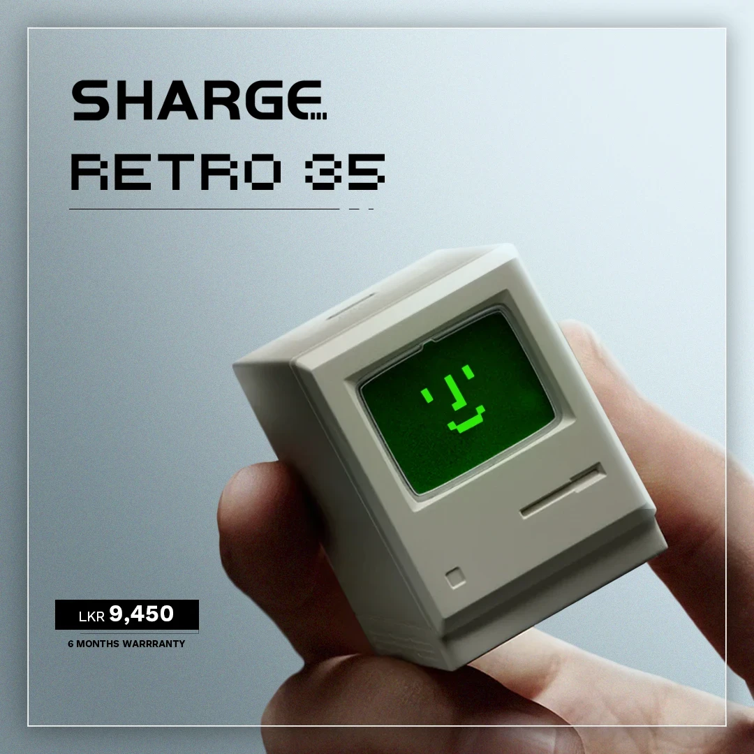 A hand holds a miniature, retro-style computer with a green pixelated smiley face on the screen, accompanied by text detailing a product name "Sharge Retro 35," a price of 9,450 LKR, and a warranty of six months, all set against a minimalist gray background.