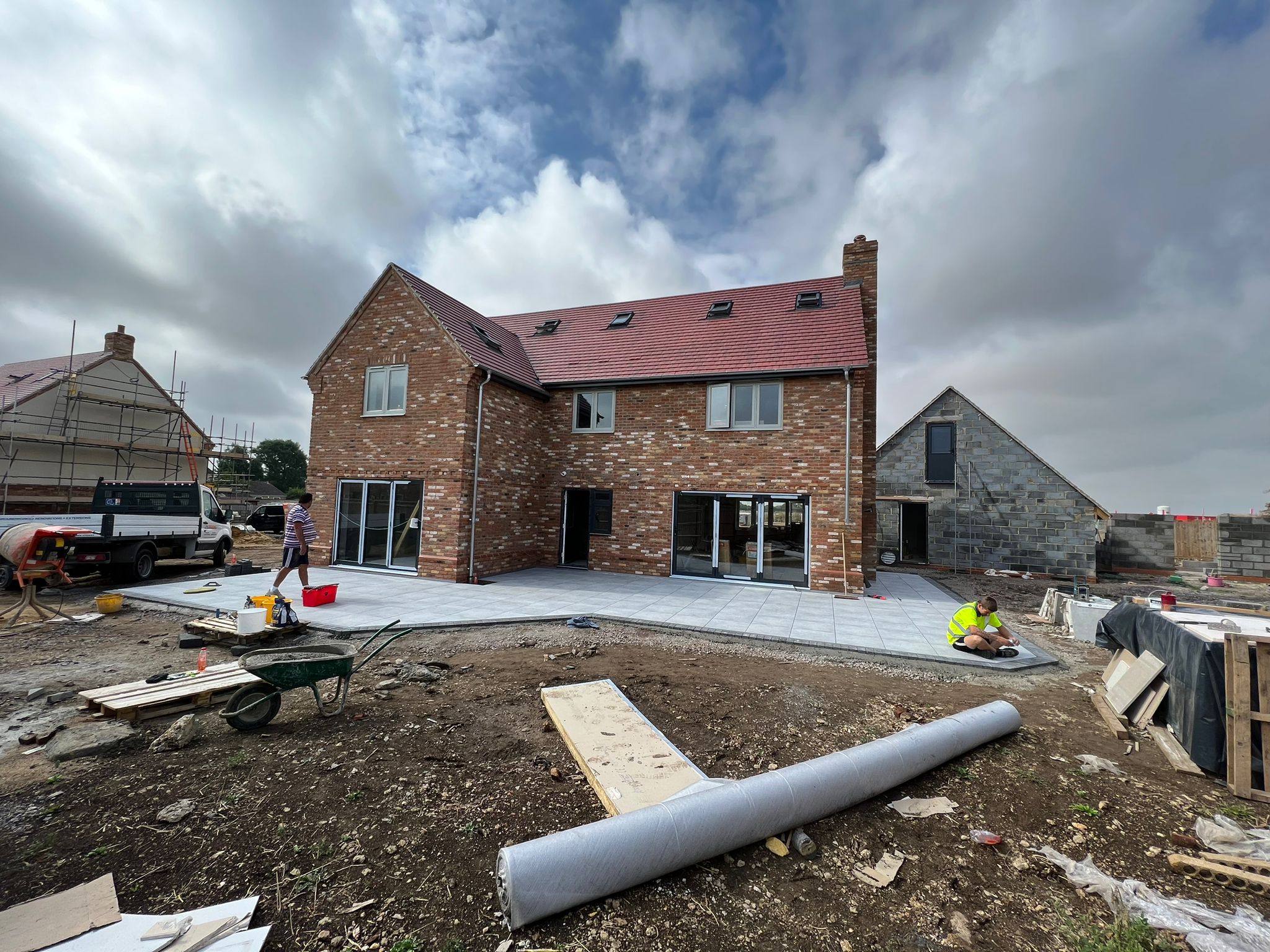 A roof with a birdhouse on top of it