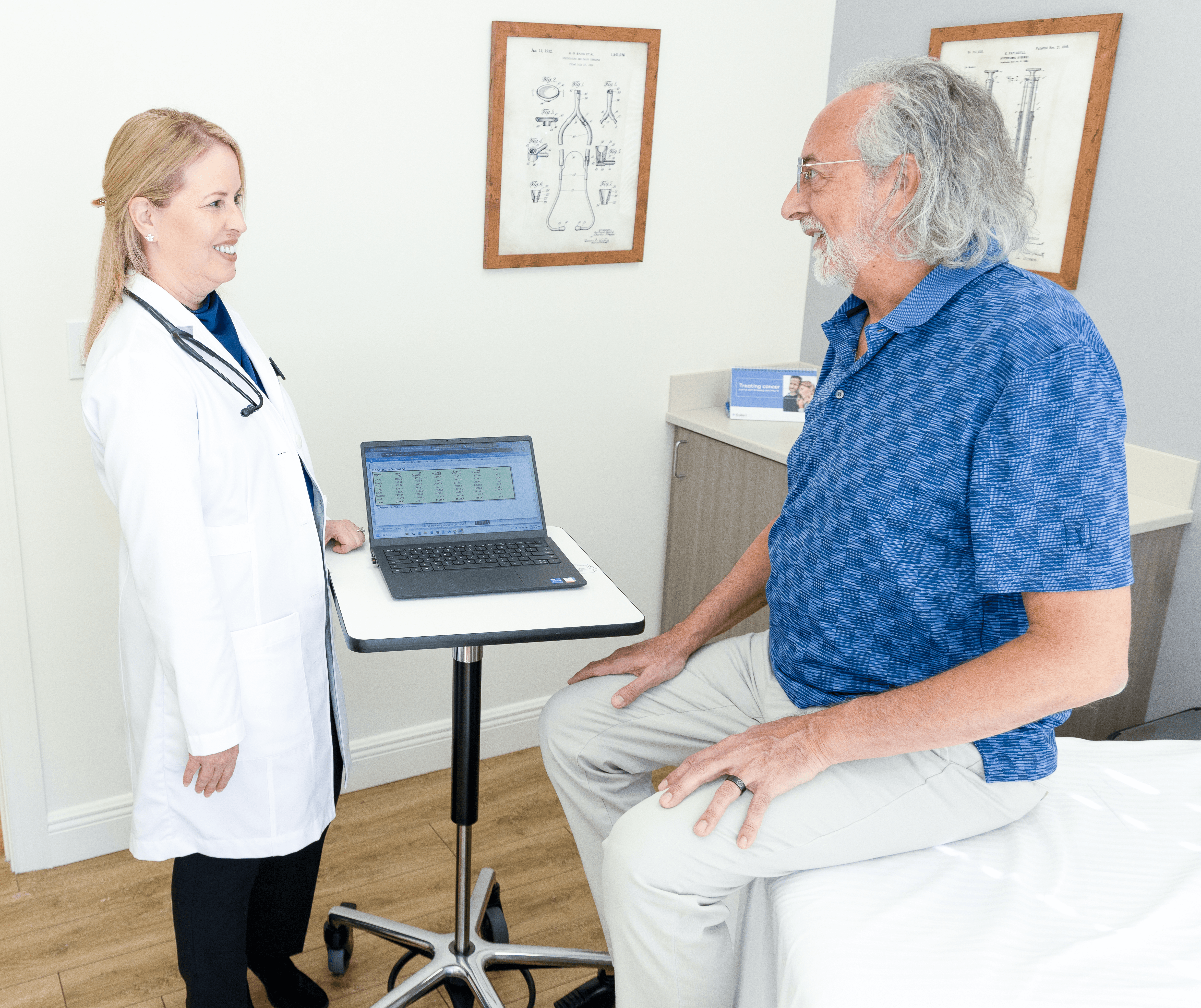 Dr. Migdalia Merida consulting with a Harper Health member about specialist referrals and coordinated care in Sarasota.