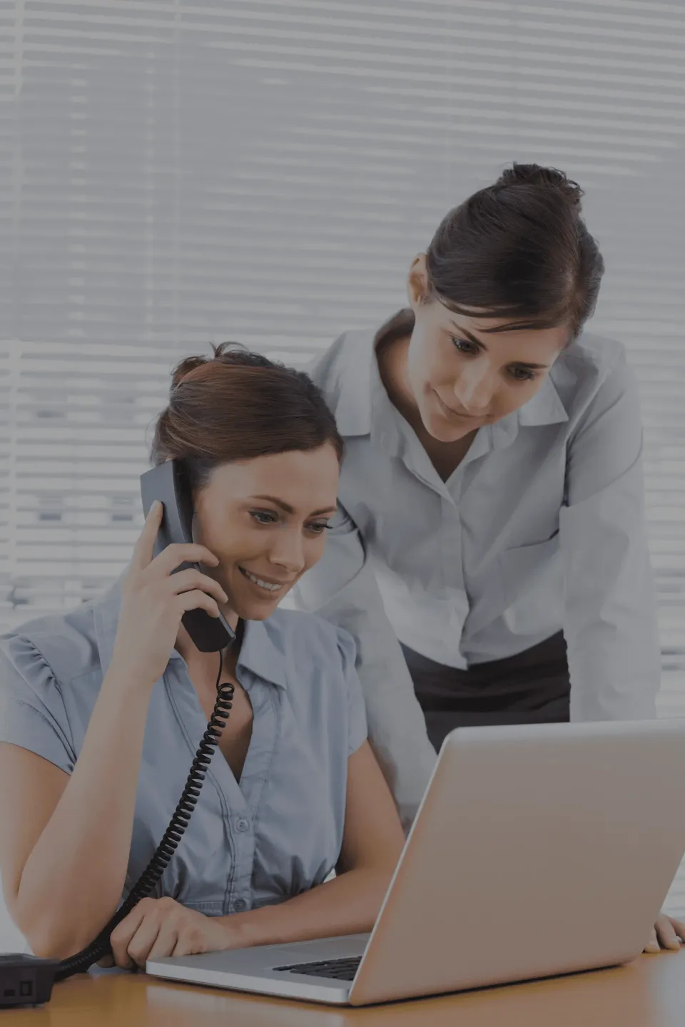 Freight pricing rep using a centralized quoting tool to check market rates, review lane history, and apply margin logic, representing the workflow capabilities of Talento's Pricing Intelligence Suite.