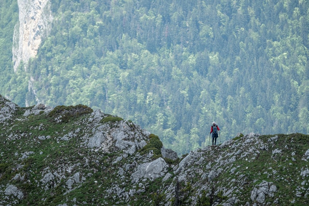 Hiker on a high ridge while hiking in Balkans