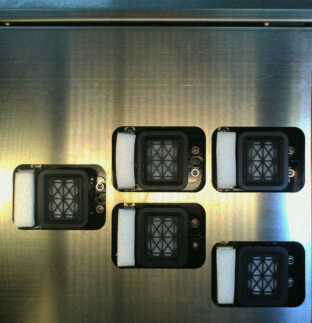 Automated maintenance cleaning view 1 of the Gravity Pro DTF printer, capturing the top-down perspective of the nozzle cleaning station.
