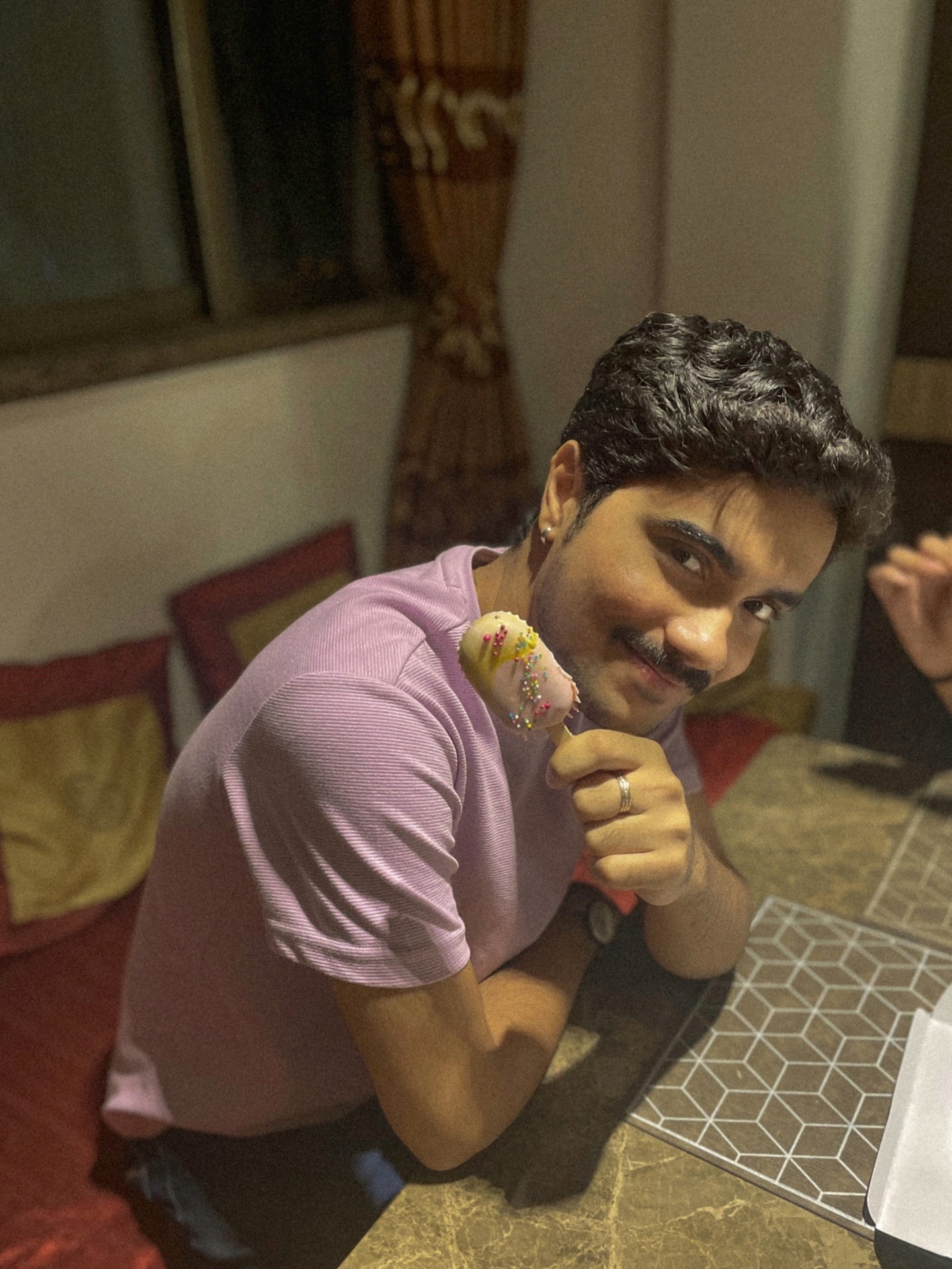 A young man riding a bicycle