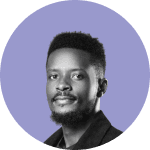 a woman wearing sunglasses standing in front of a body of water