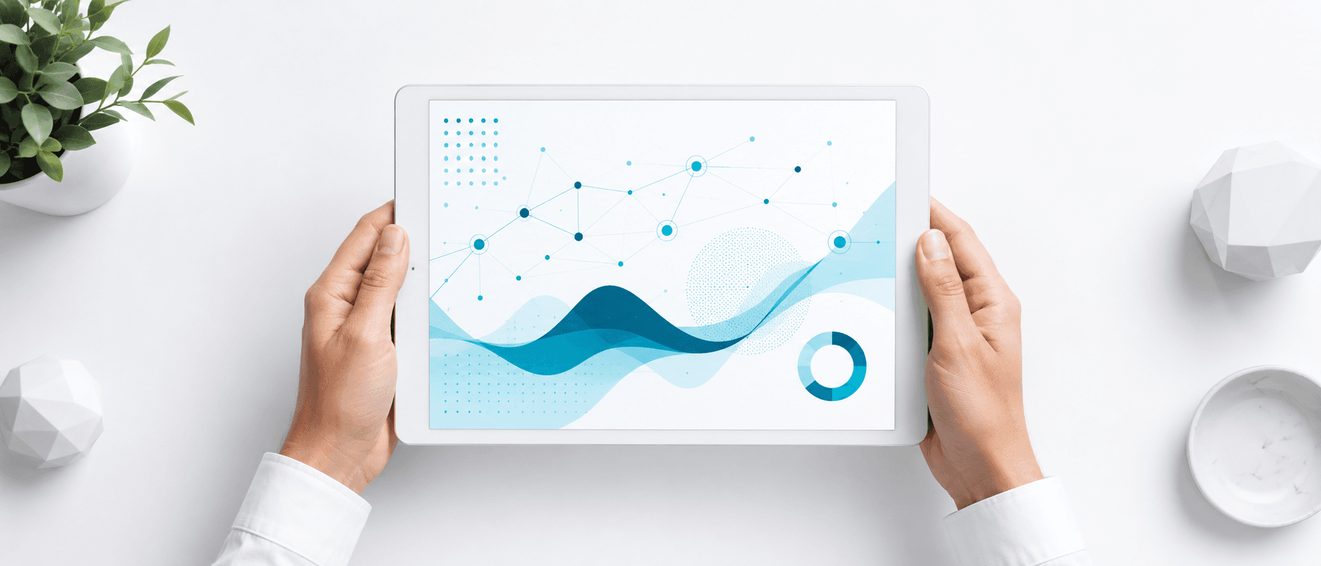 Overhead view of two hands holding a white tablet with a minimal teal and cyan data visualization, representing Beacon4ai's Content Strategy Tool turning content planning into a clear, repeatable workflow.
