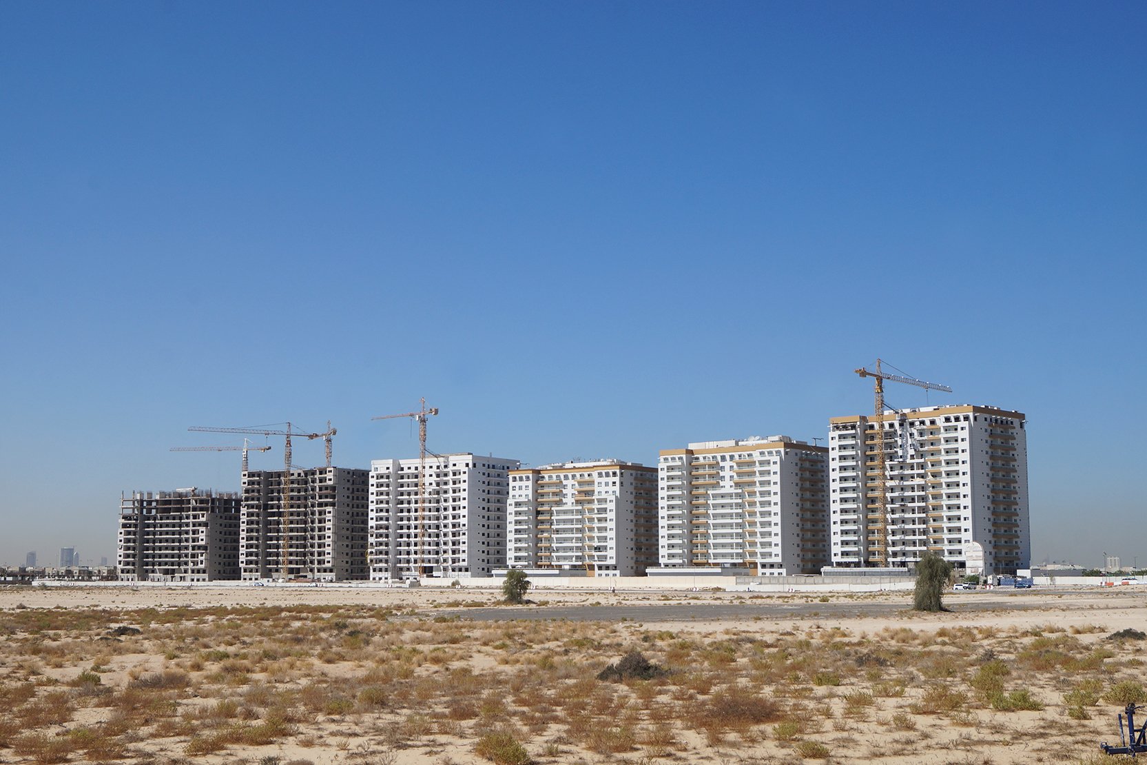 New residential towers under construction in Living Legends. Contact our real estate office for investment ROI.