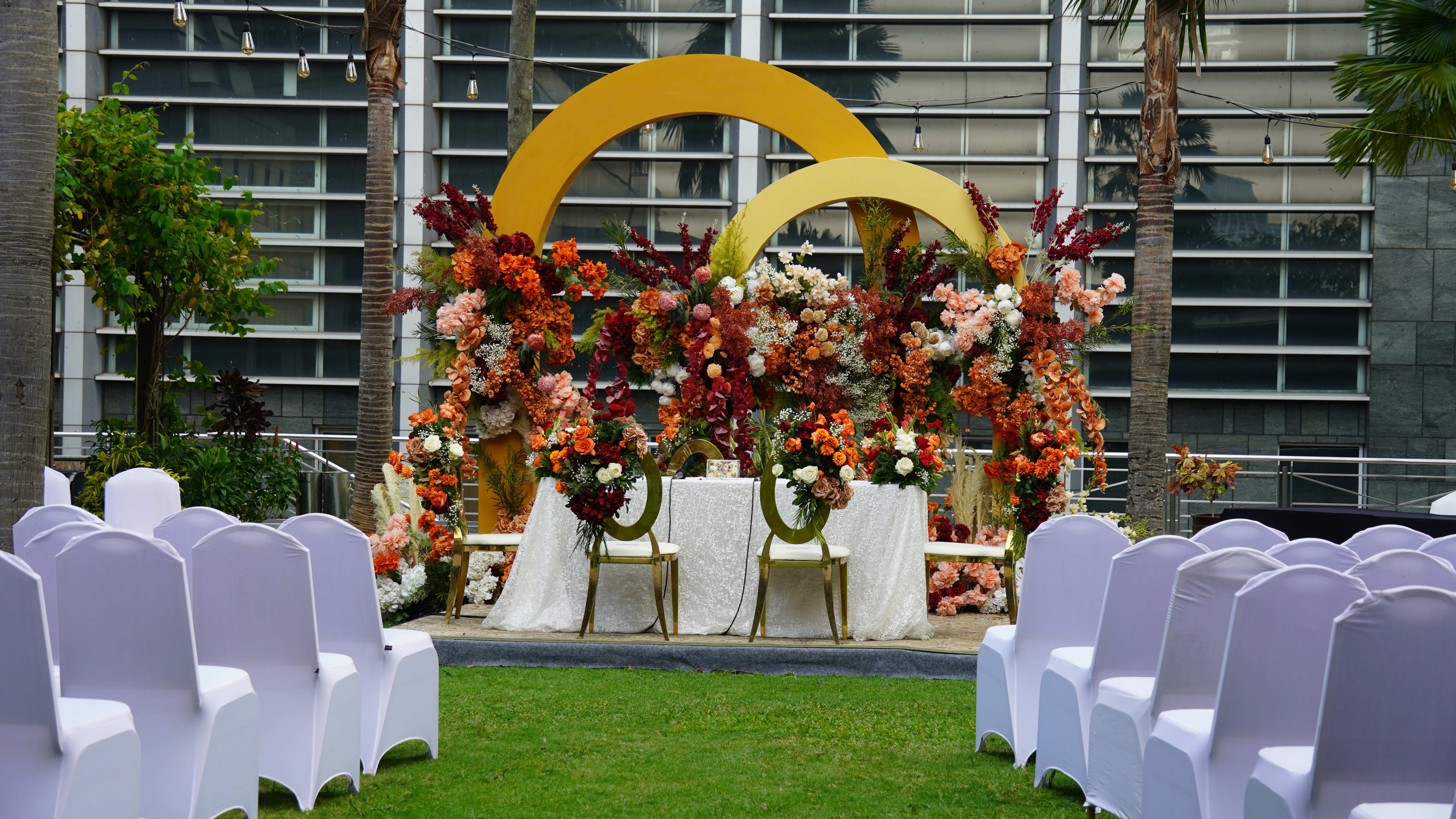 Wedding ceremony setup with beautiful floral arrangements.