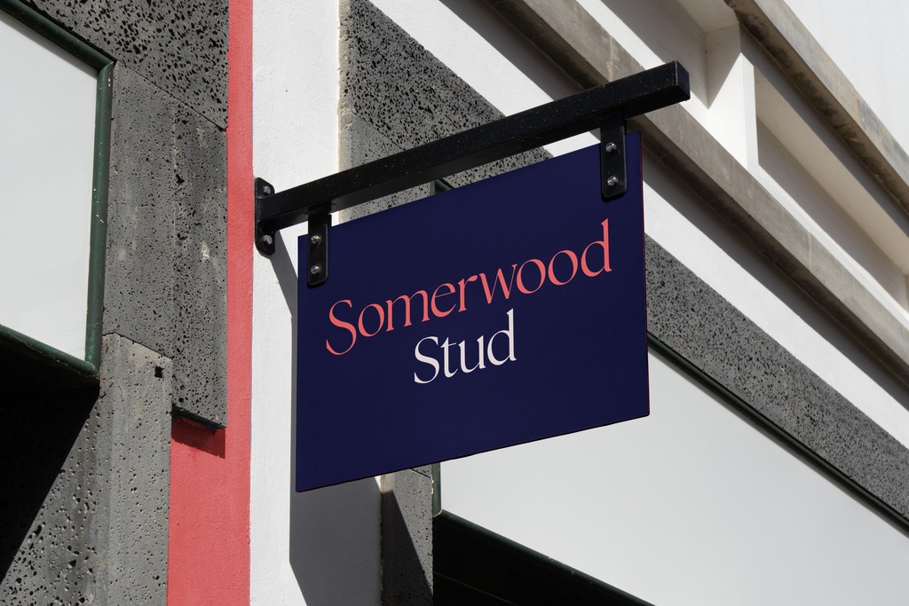 Somerwood Stud signage design with logo design running on blue across blade sign