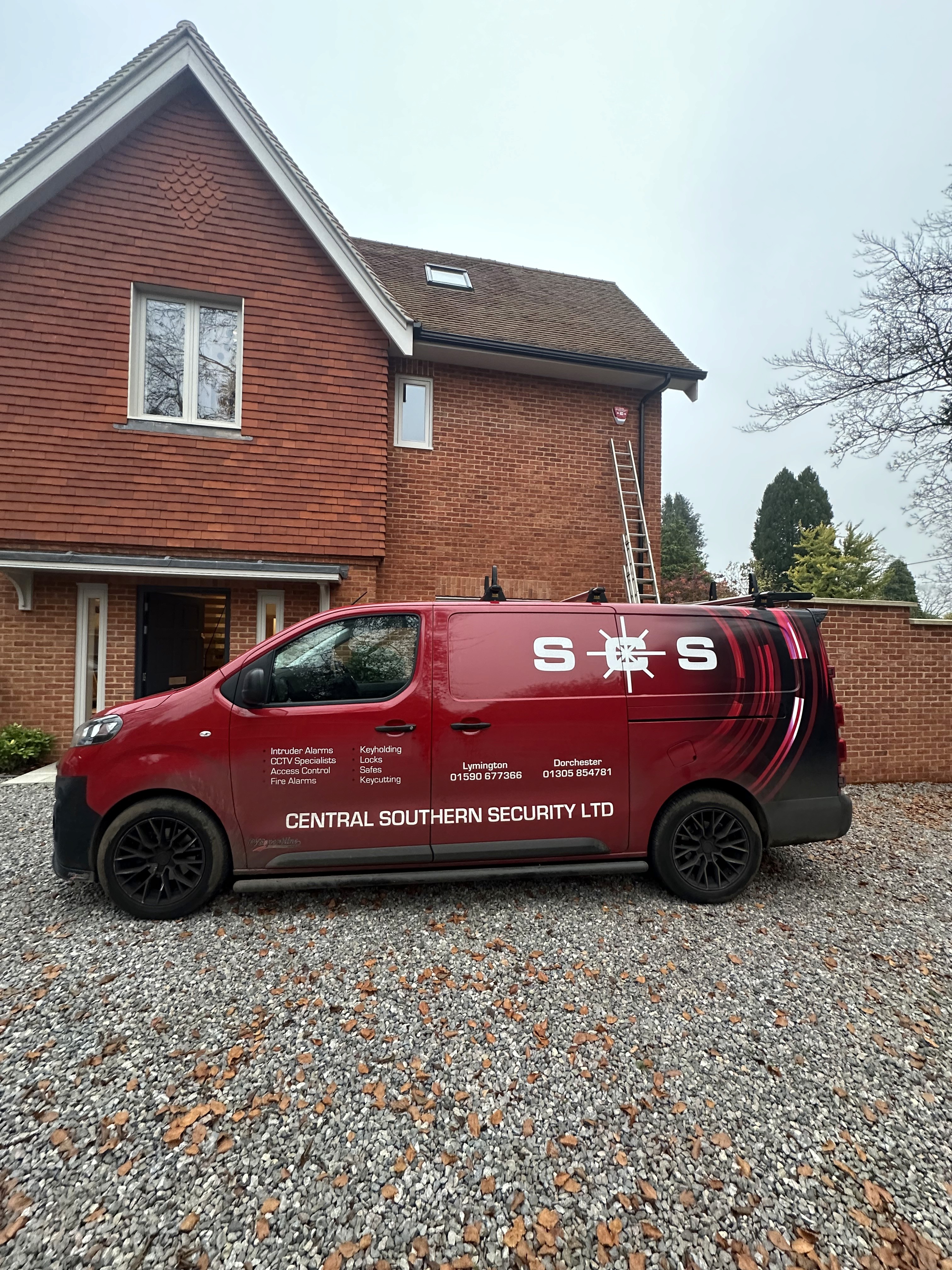 man holding shooting camera