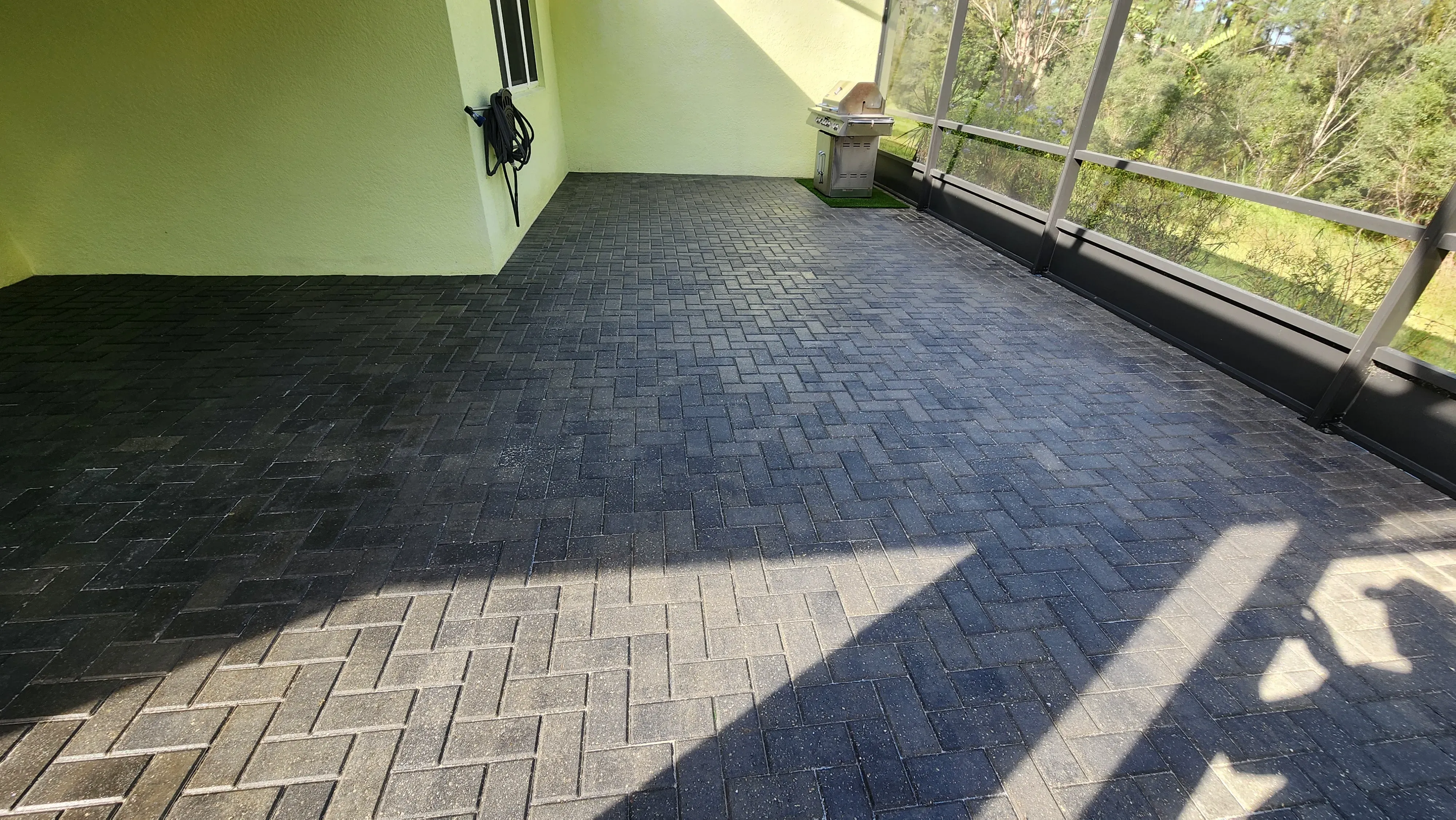 paver patio in Daytona Beach, FL restored and sealed under ideal dry-season conditions by Castle Clean & Seal