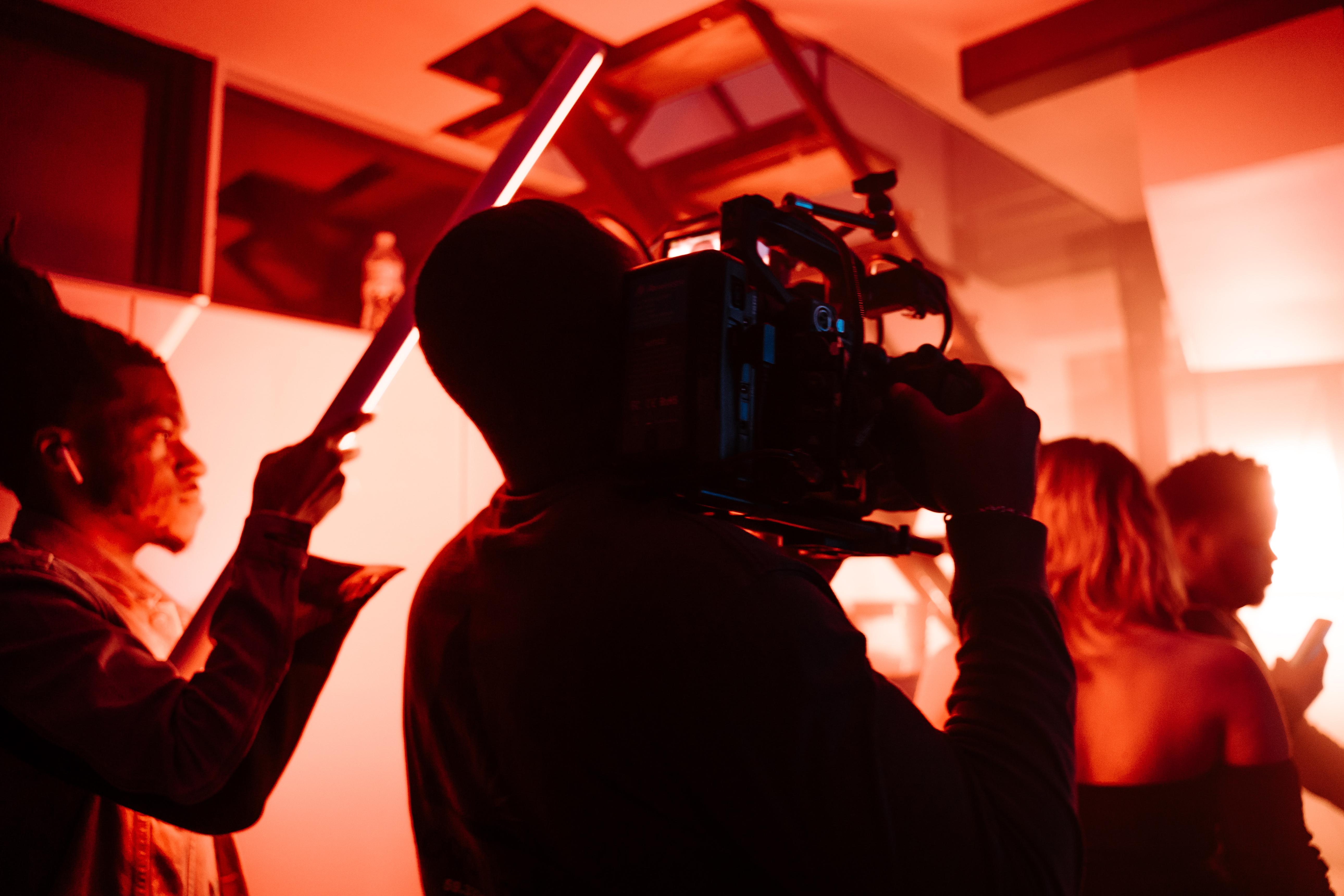 Woman near microphone in recording studio