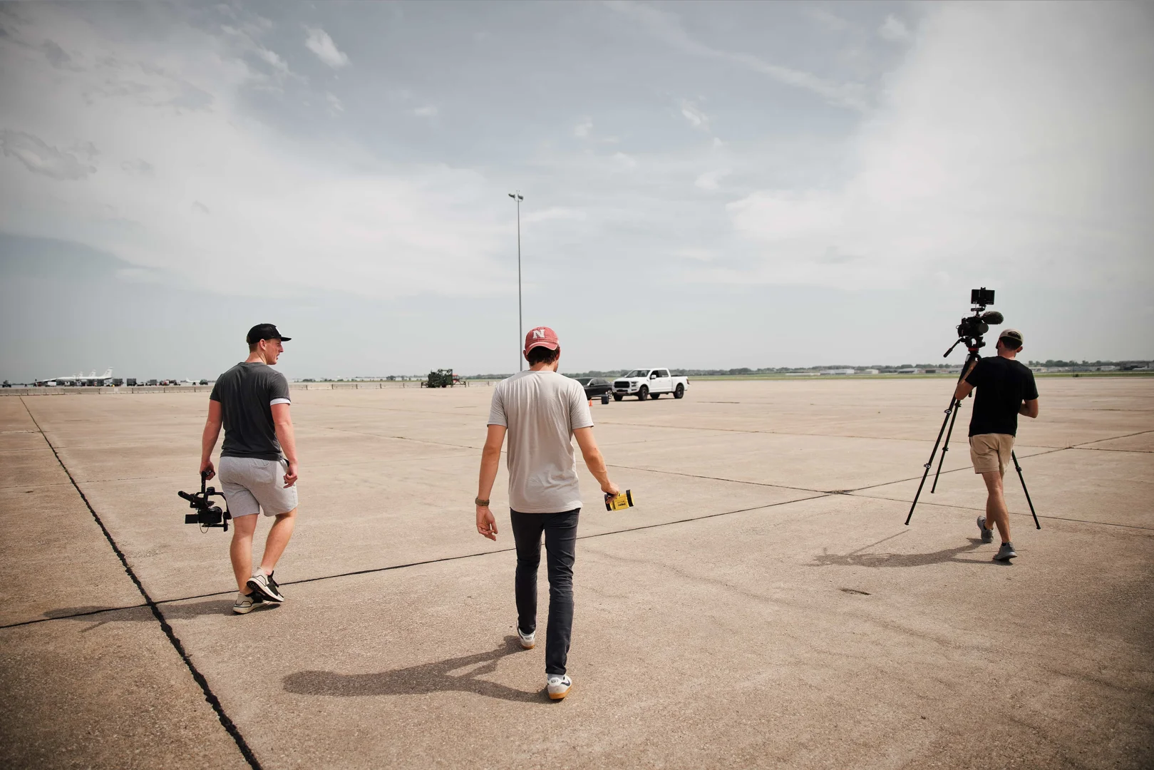 A dynamic shot of Creative Olsen's team working on a video production set or a high-quality commercial photograph