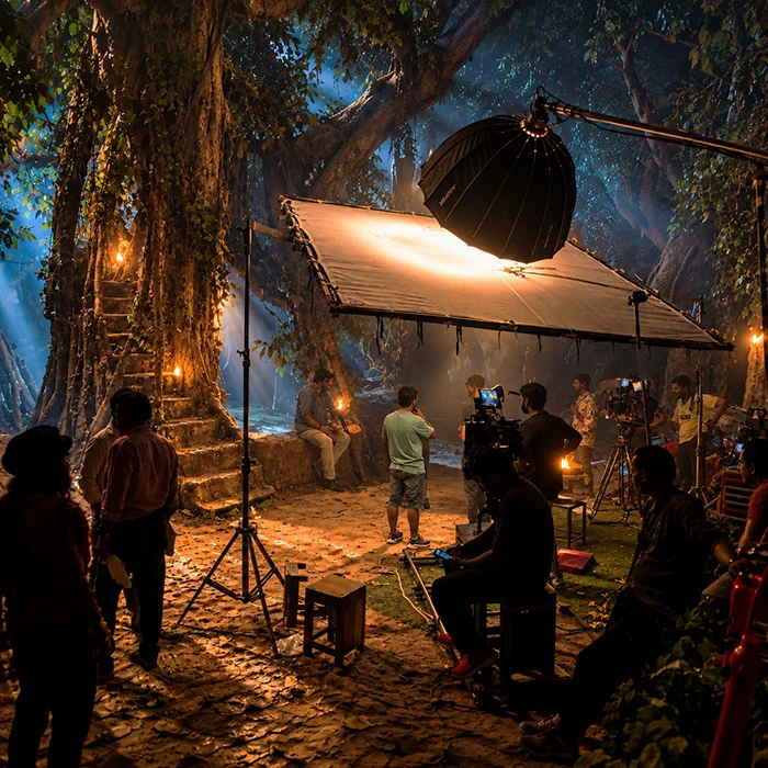 Behind-the-scenes film production set with professional camera and lighting crew at Cinesta