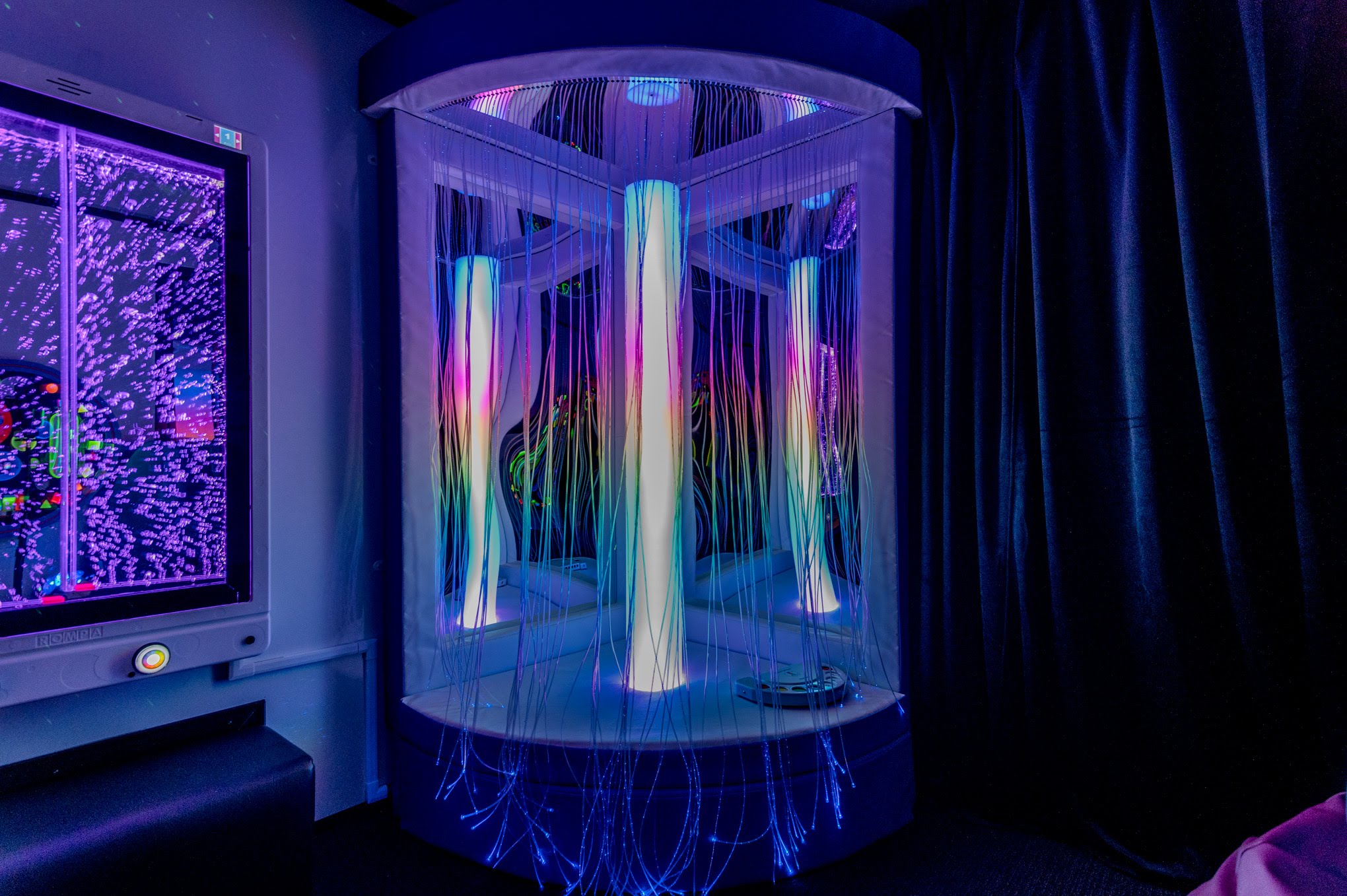 A bottle of daisy perfume with floral accents.