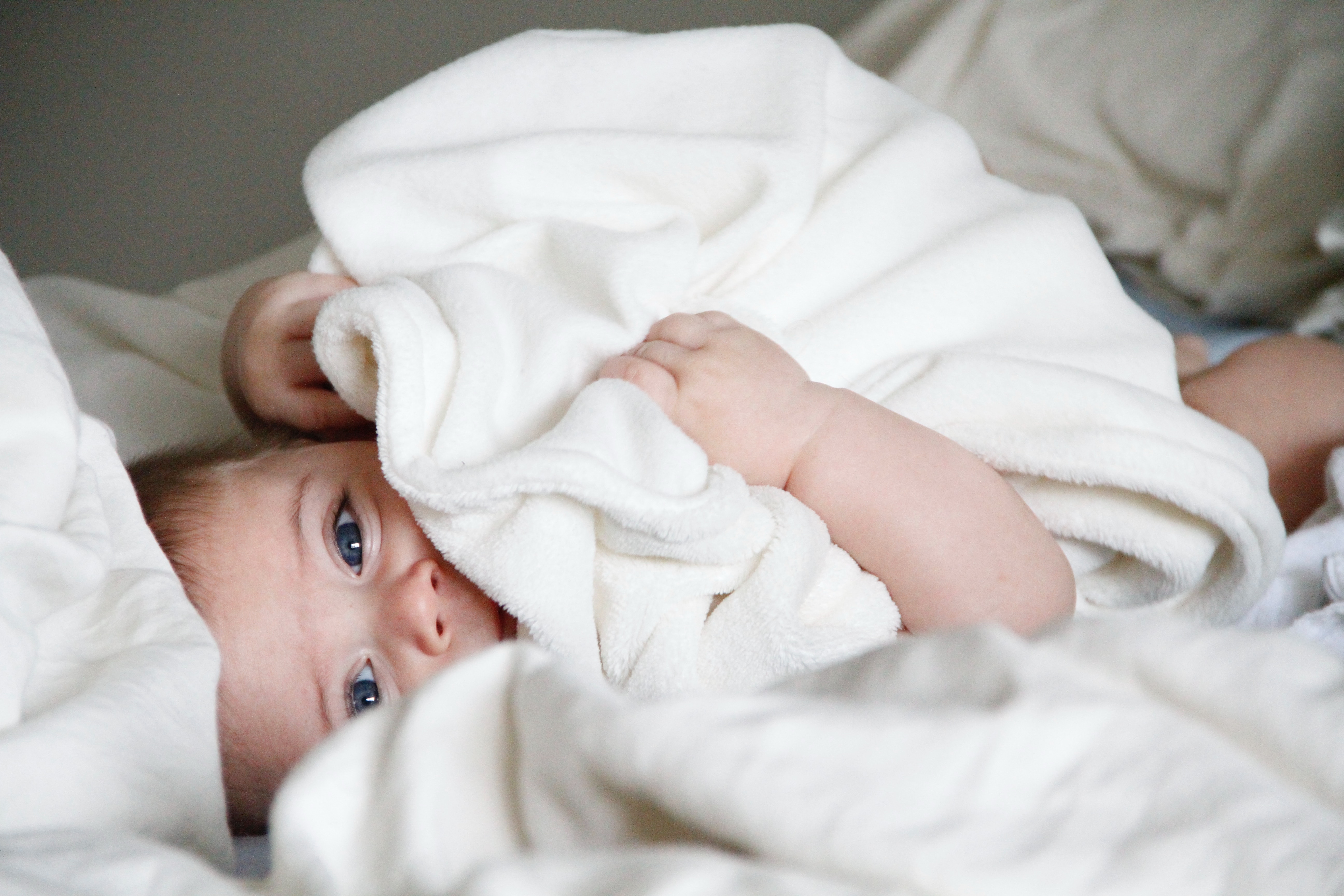 Baby wrapped in towel hot sale