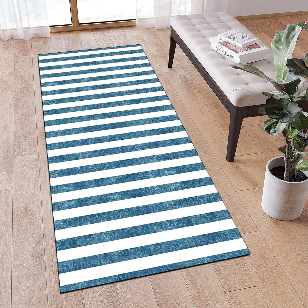 Blue and white runner rug brings elegance and charm to any space.