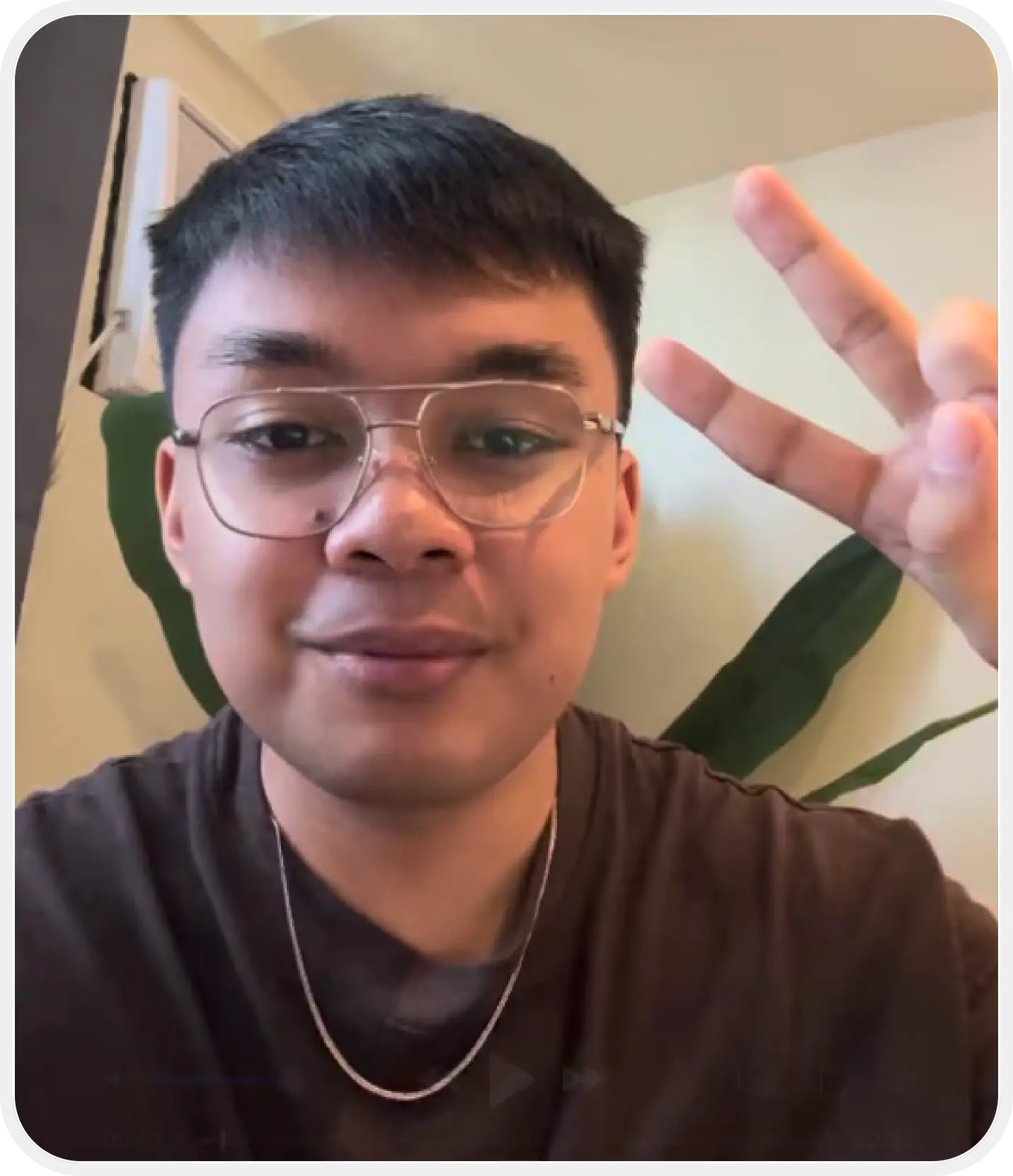 man standing beside wall