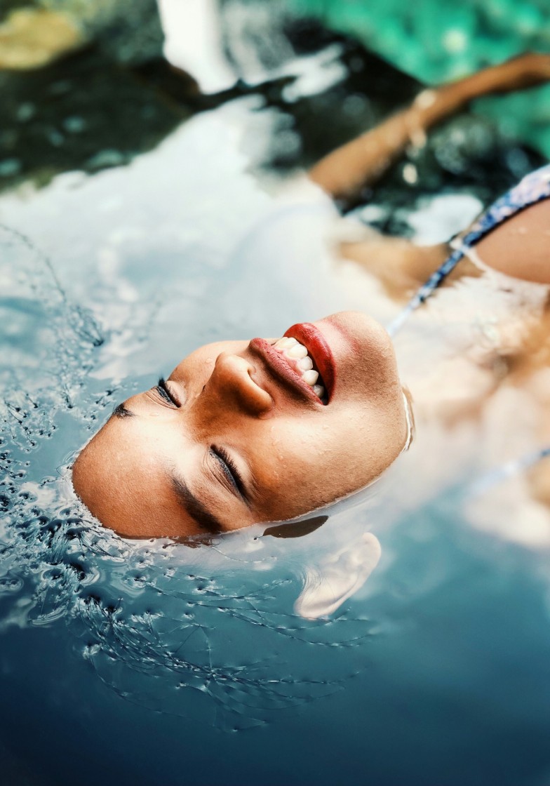 Woman floating in water