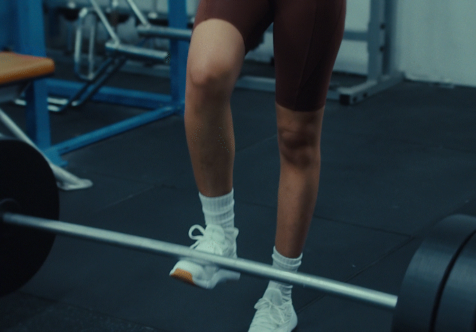 A rustic dining room with wooden table and chairs.